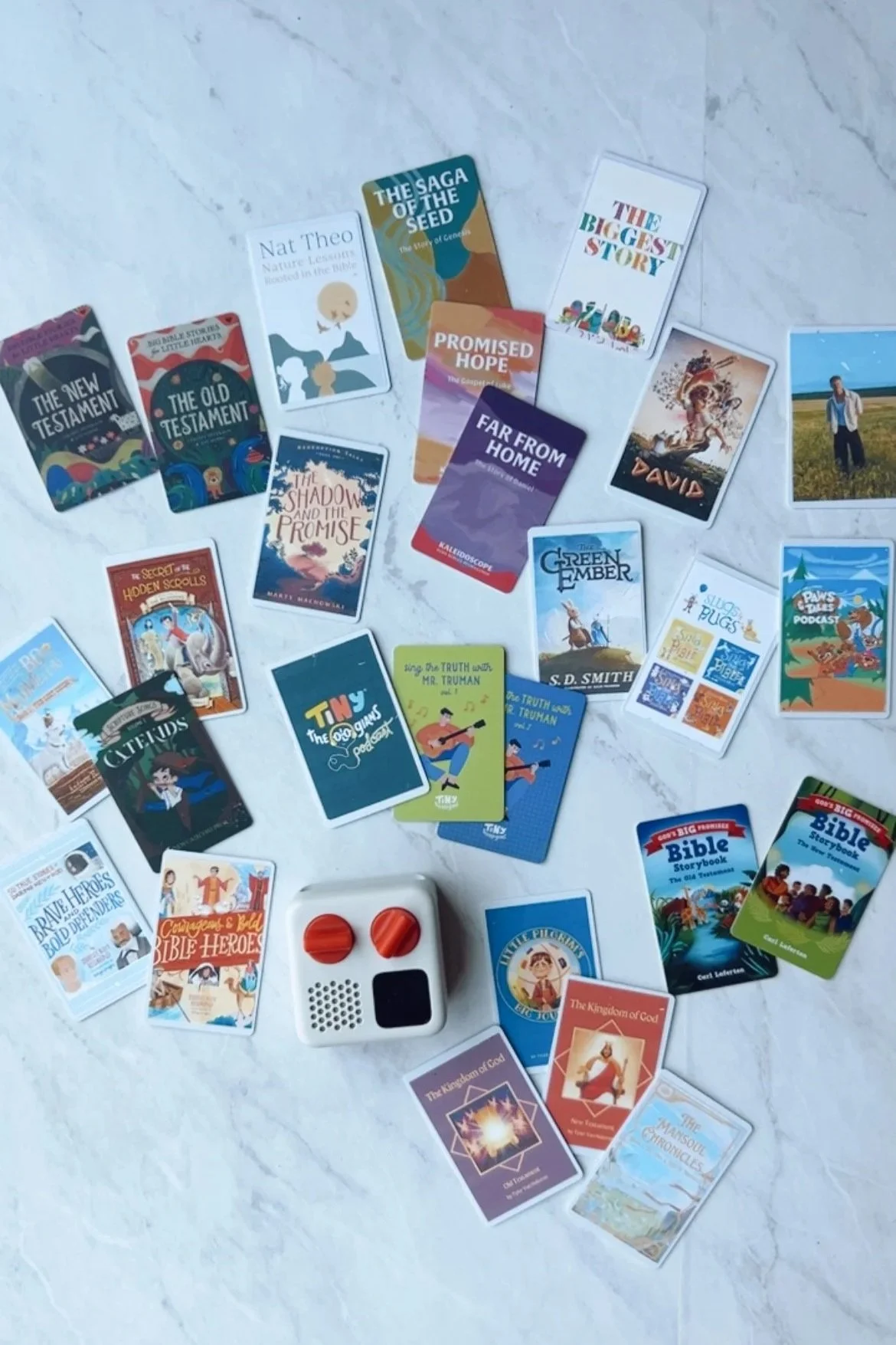 Collection of Christian Yoto cards and Make Your Own cards arranged on a white countertop