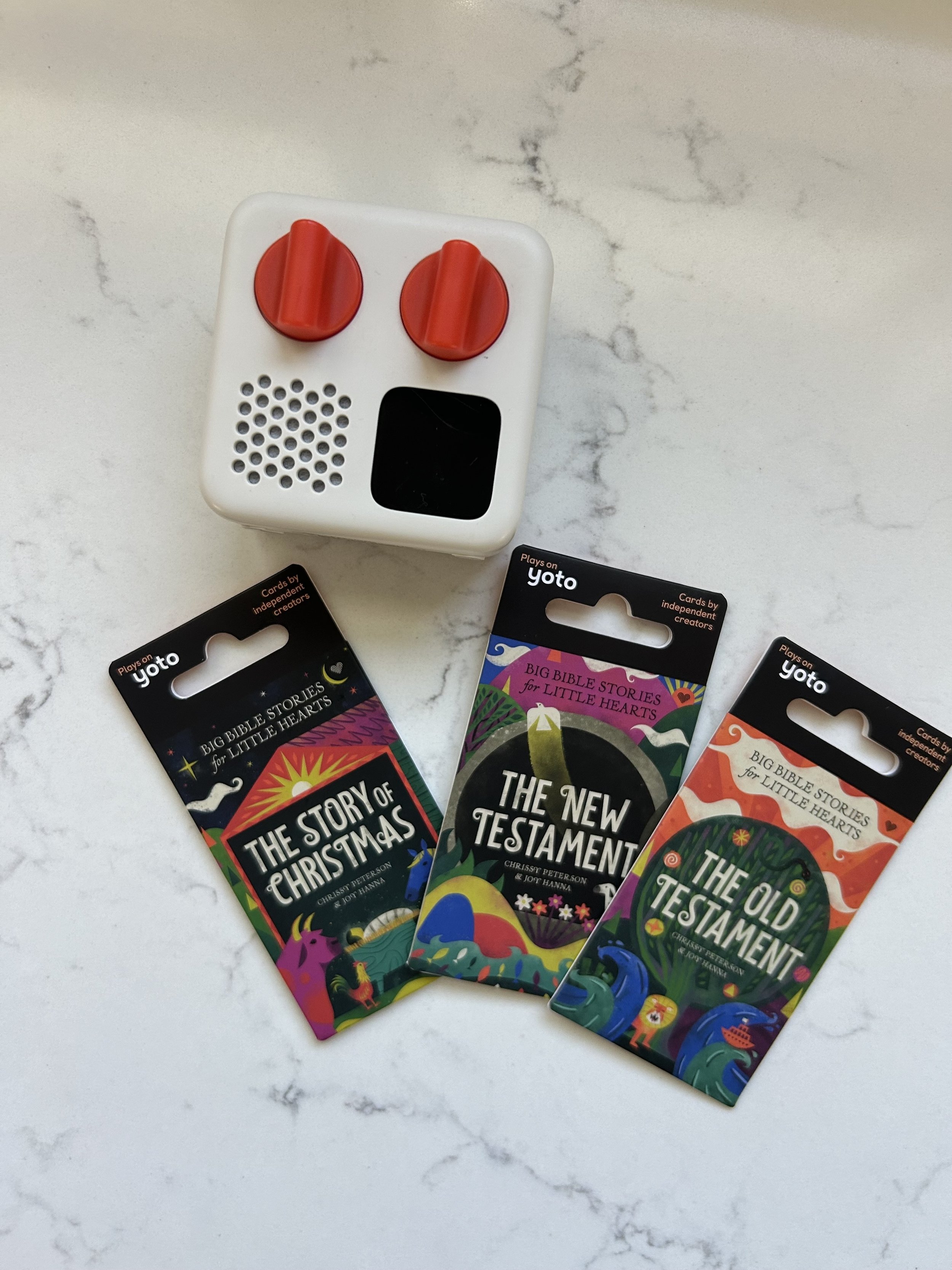 Yoto Mini with Big Bible Stories cards featuring Old Testament, New Testament, and The Story of Christmas