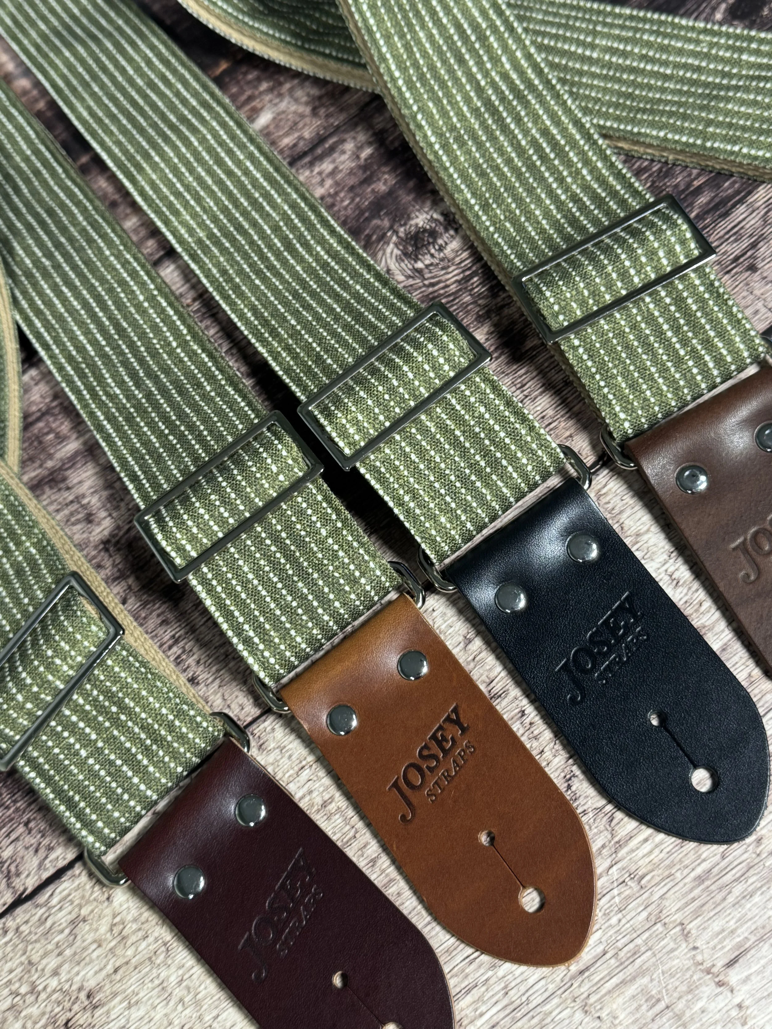 Olive green woven guitar strap with subtle stripe pattern and leather ends by Josey Straps, Mr. Green Jeans design