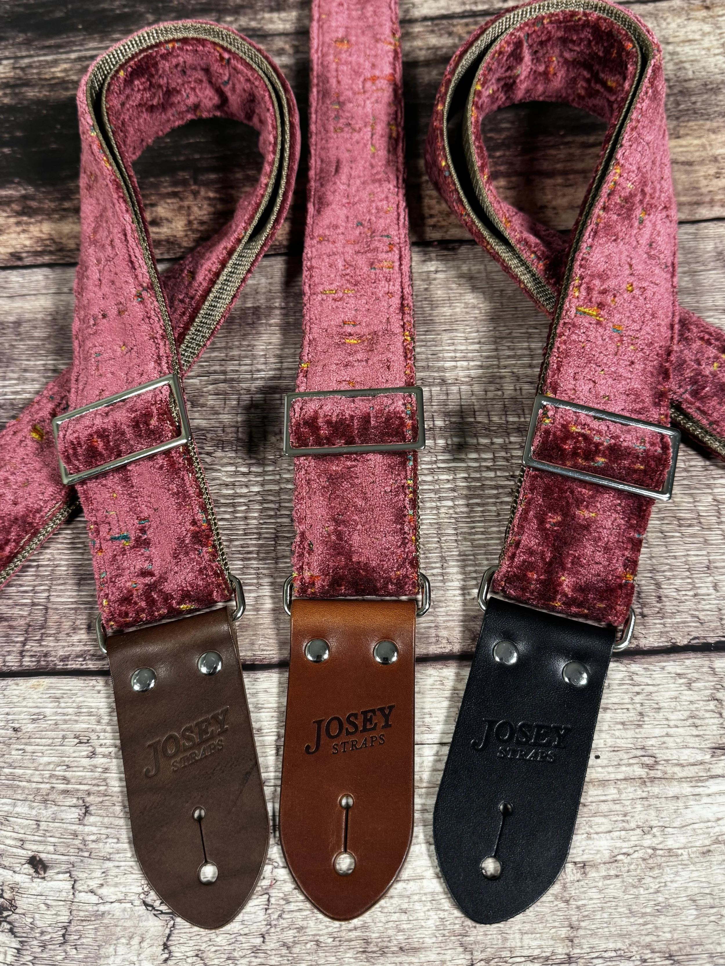 Telly handmade pink guitar strap by Josey Straps featuring textured dusty-rose fabric with colorful flecks and premium leather ends.