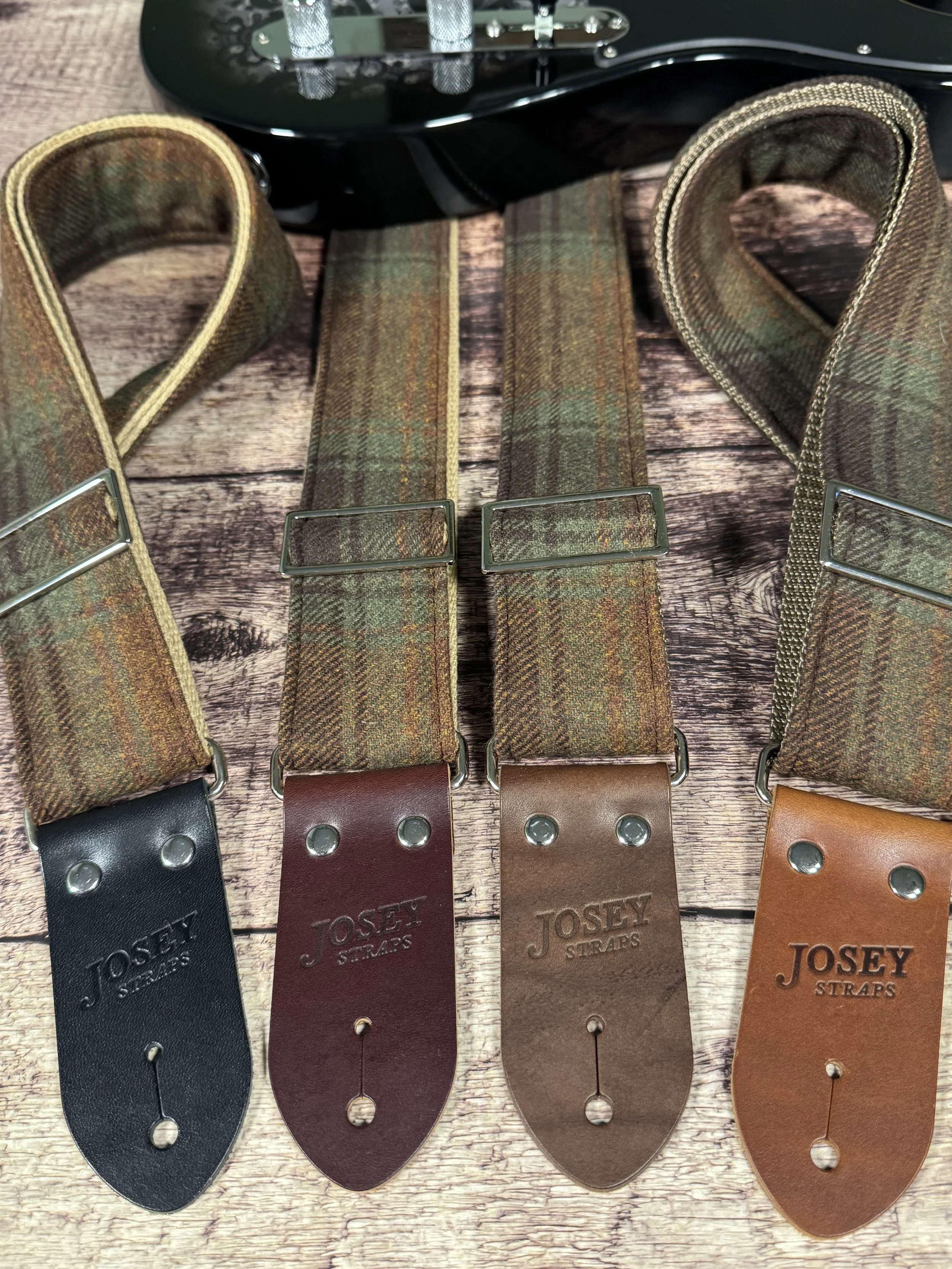 Aberdeen guitar strap featuring vintage plaid fabric and premium leather ends, handmade by Josey Straps