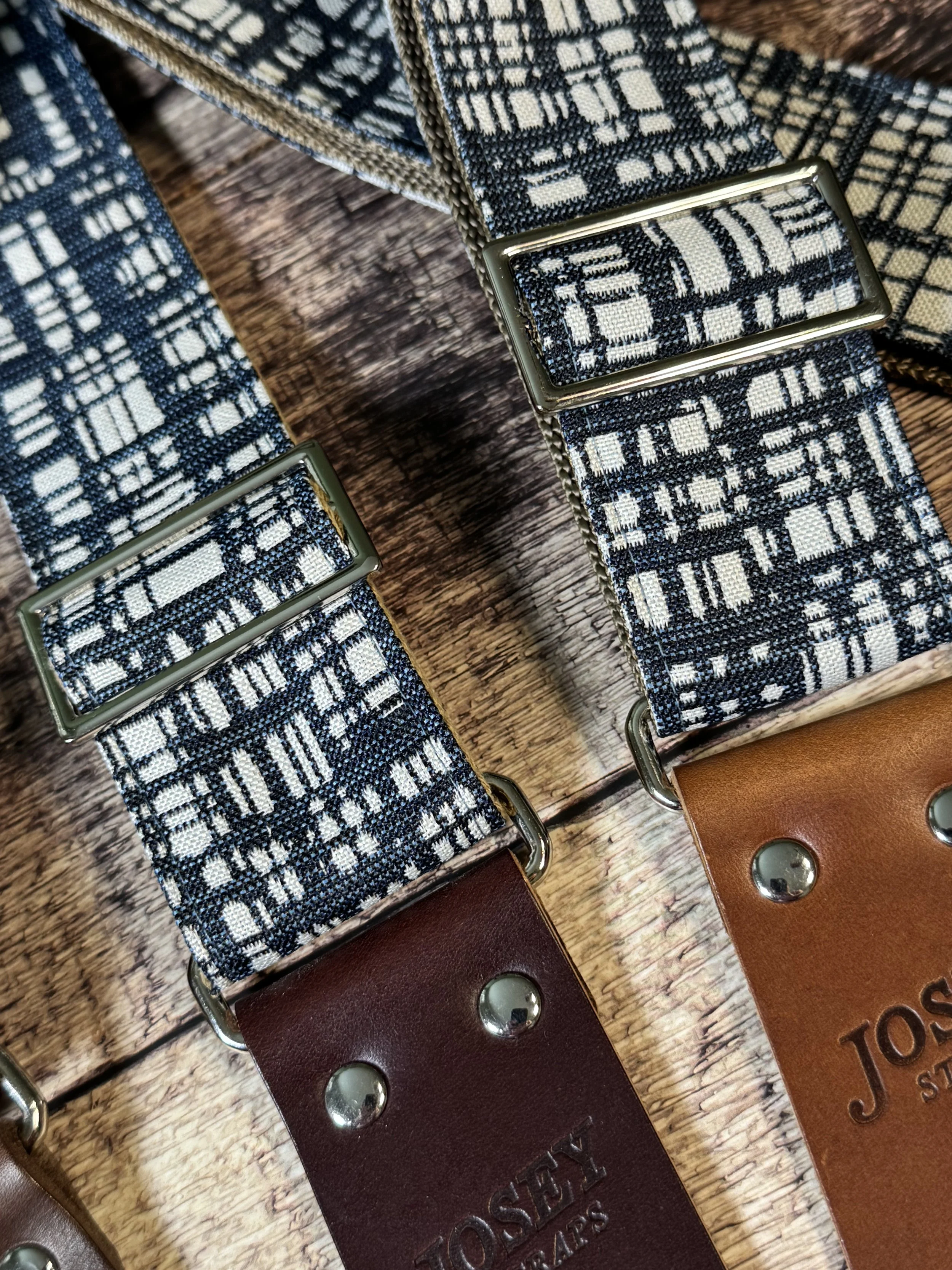 Blueprint guitar strap with blue and white crosshatch pattern and leather ends by Josey Straps.