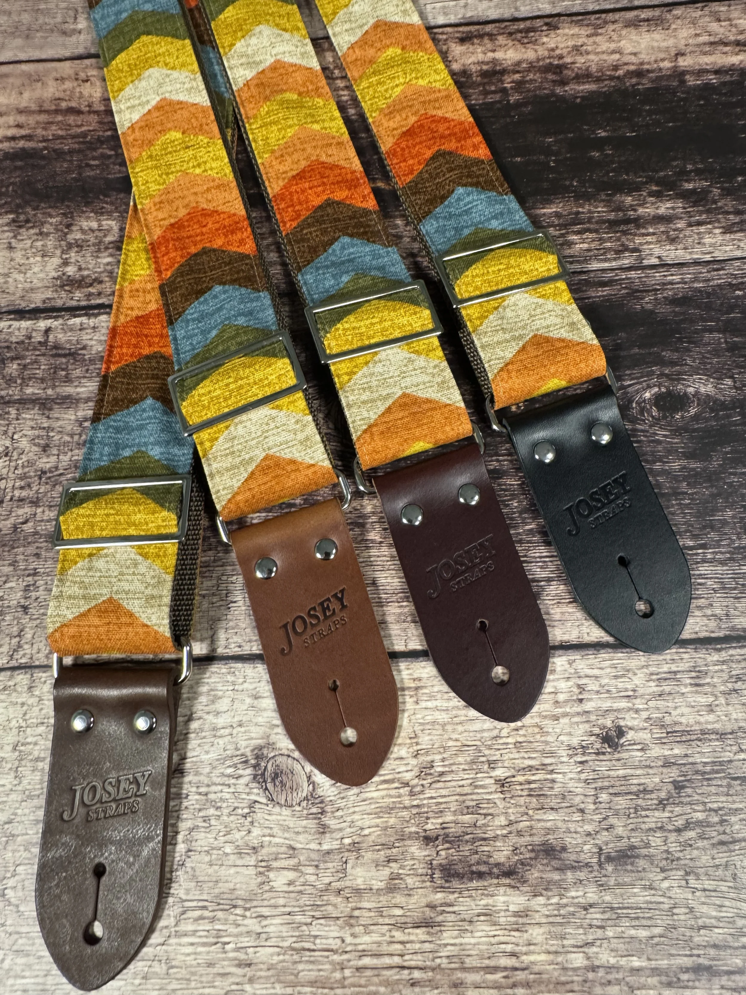 Old Mexico guitar strap by Josey Straps, vintage Southwestern chevron design in earthy tones with leather ends, bold retro style.