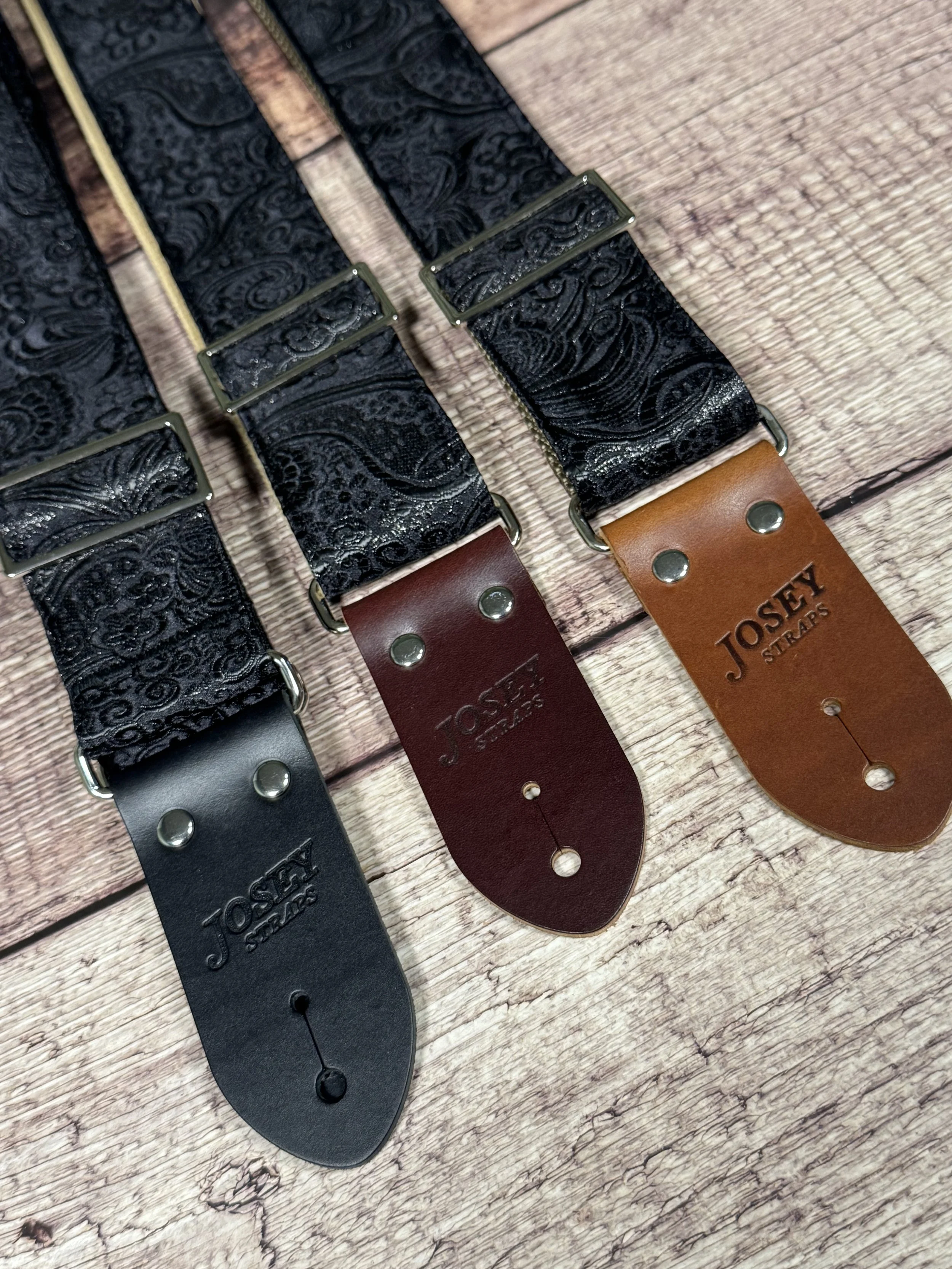 Black textured guitar strap with leather ends by Josey Straps called The Abyss