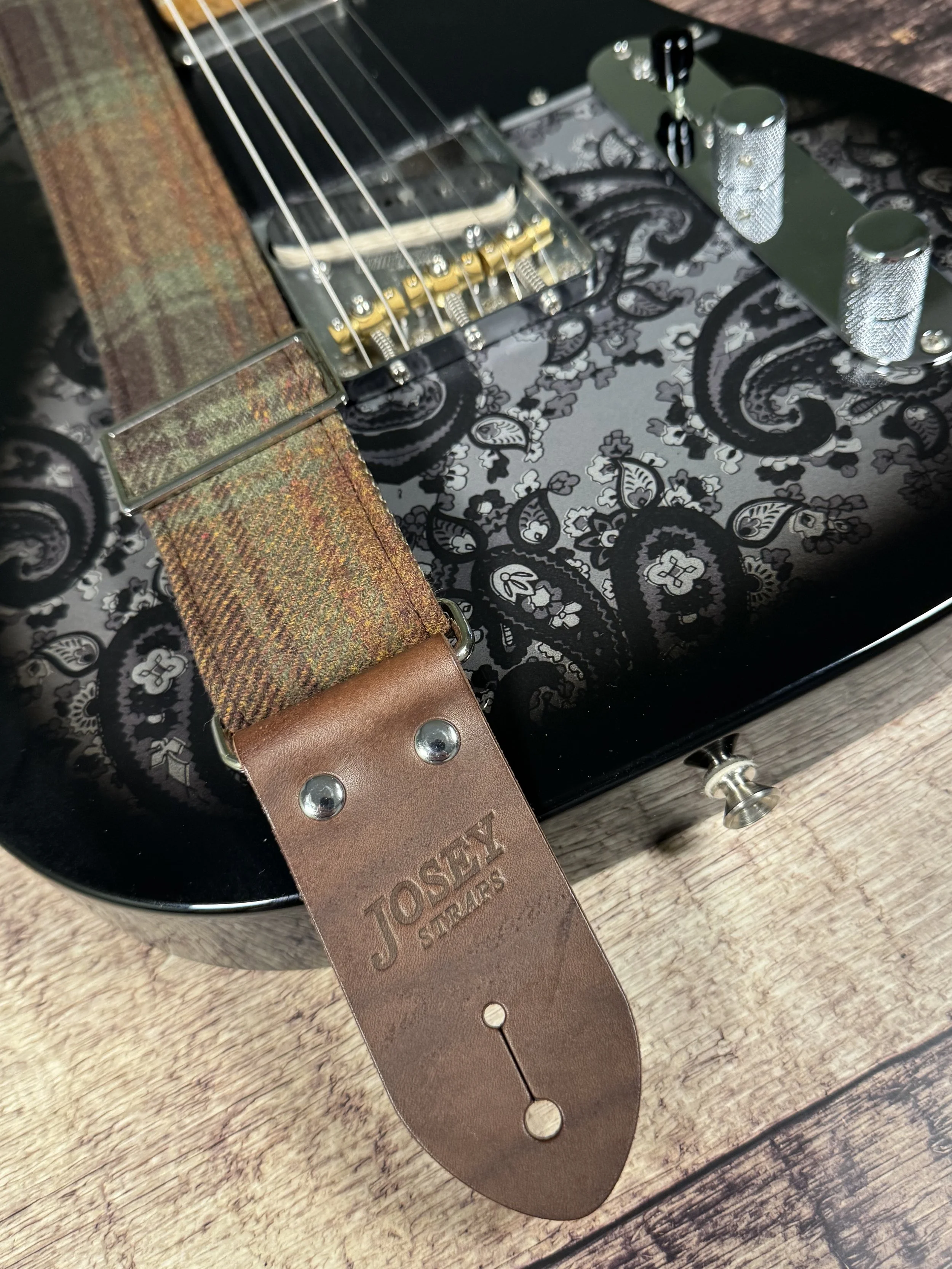 Aberdeen guitar strap featuring vintage plaid fabric and premium leather ends, handmade by Josey Straps