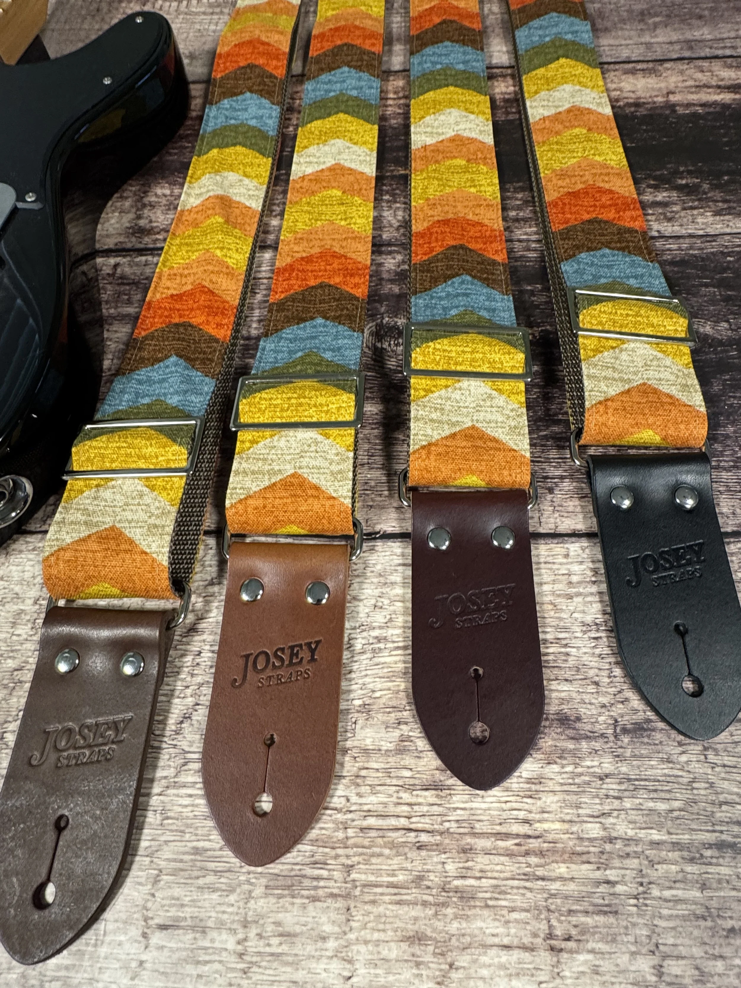 Old Mexico guitar strap by Josey Straps, vintage Southwestern chevron design in earthy tones with leather ends, bold retro style.