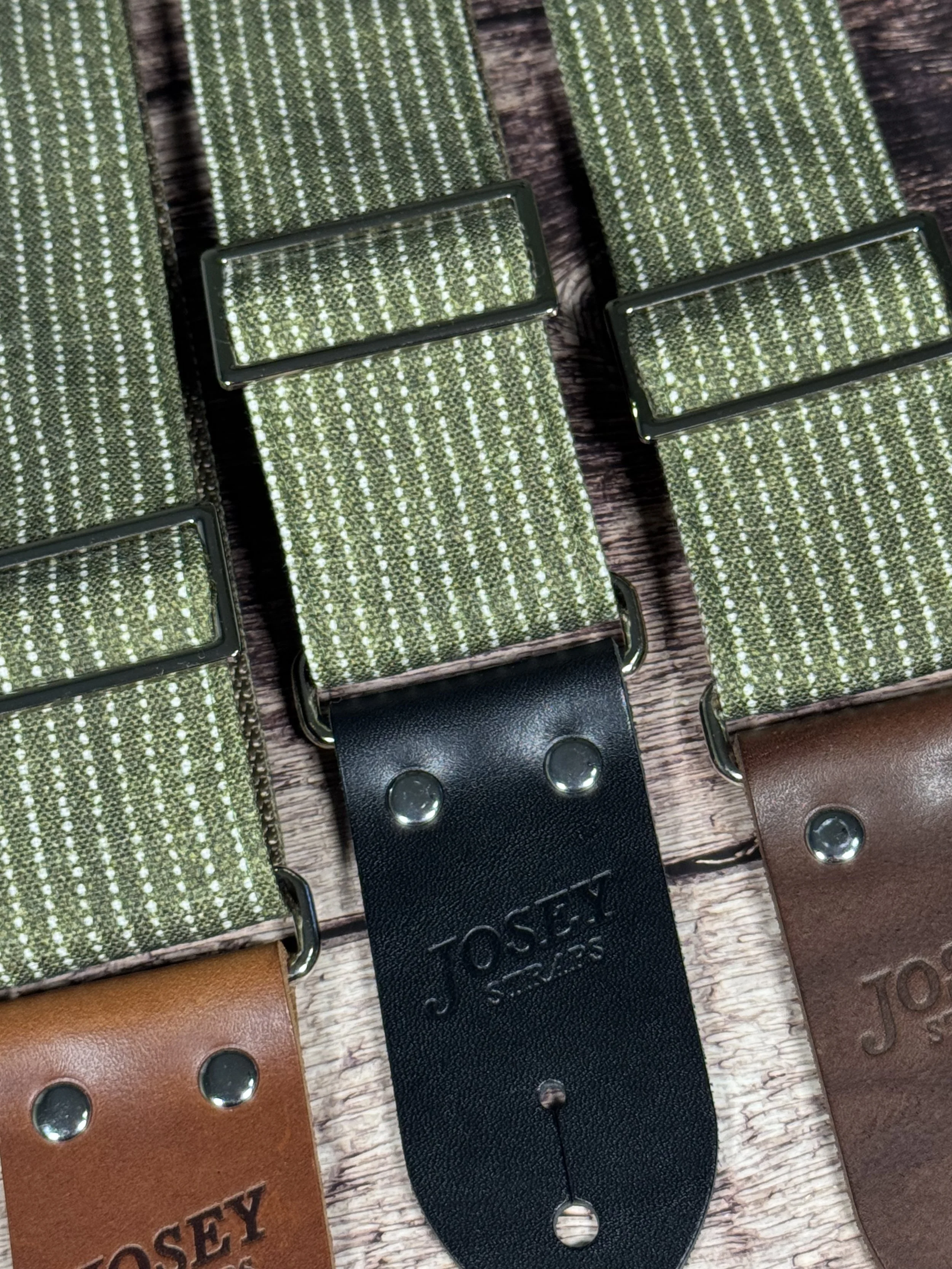 Olive green woven guitar strap with subtle stripe pattern and leather ends by Josey Straps, Mr. Green Jeans design