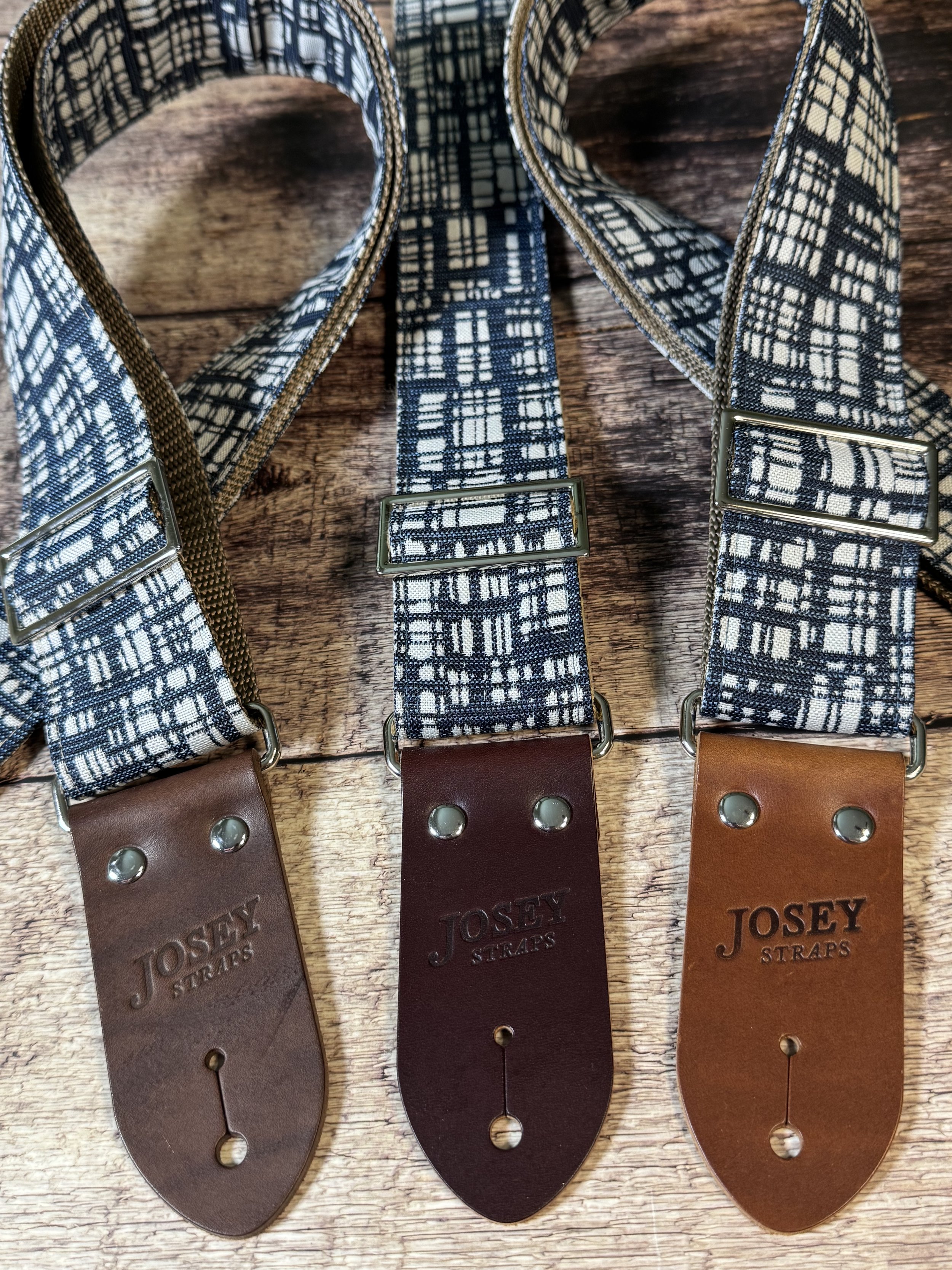 Blueprint guitar strap with blue and white crosshatch pattern and leather ends by Josey Straps.