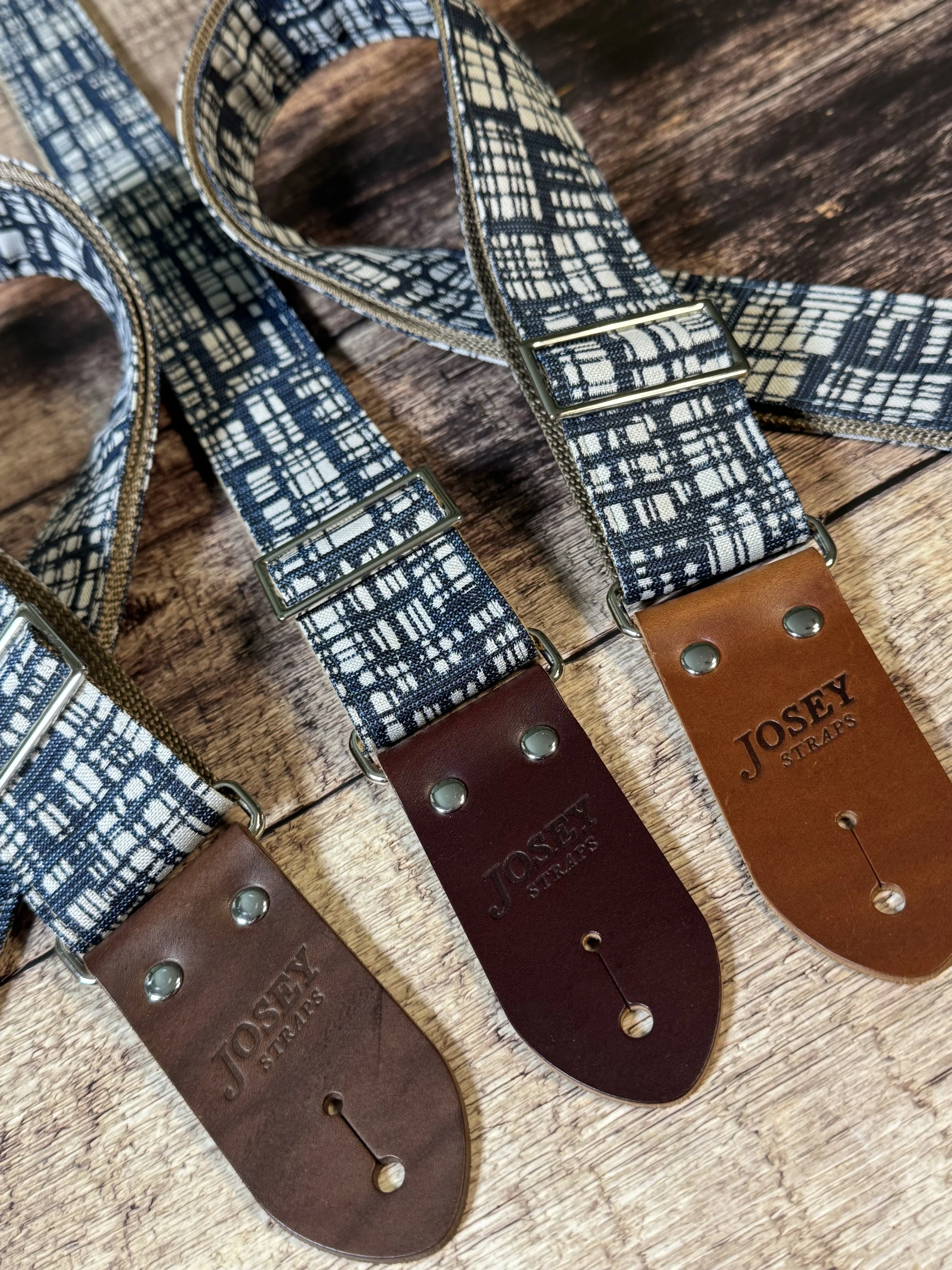 Blueprint guitar strap with blue and white crosshatch pattern and leather ends by Josey Straps.