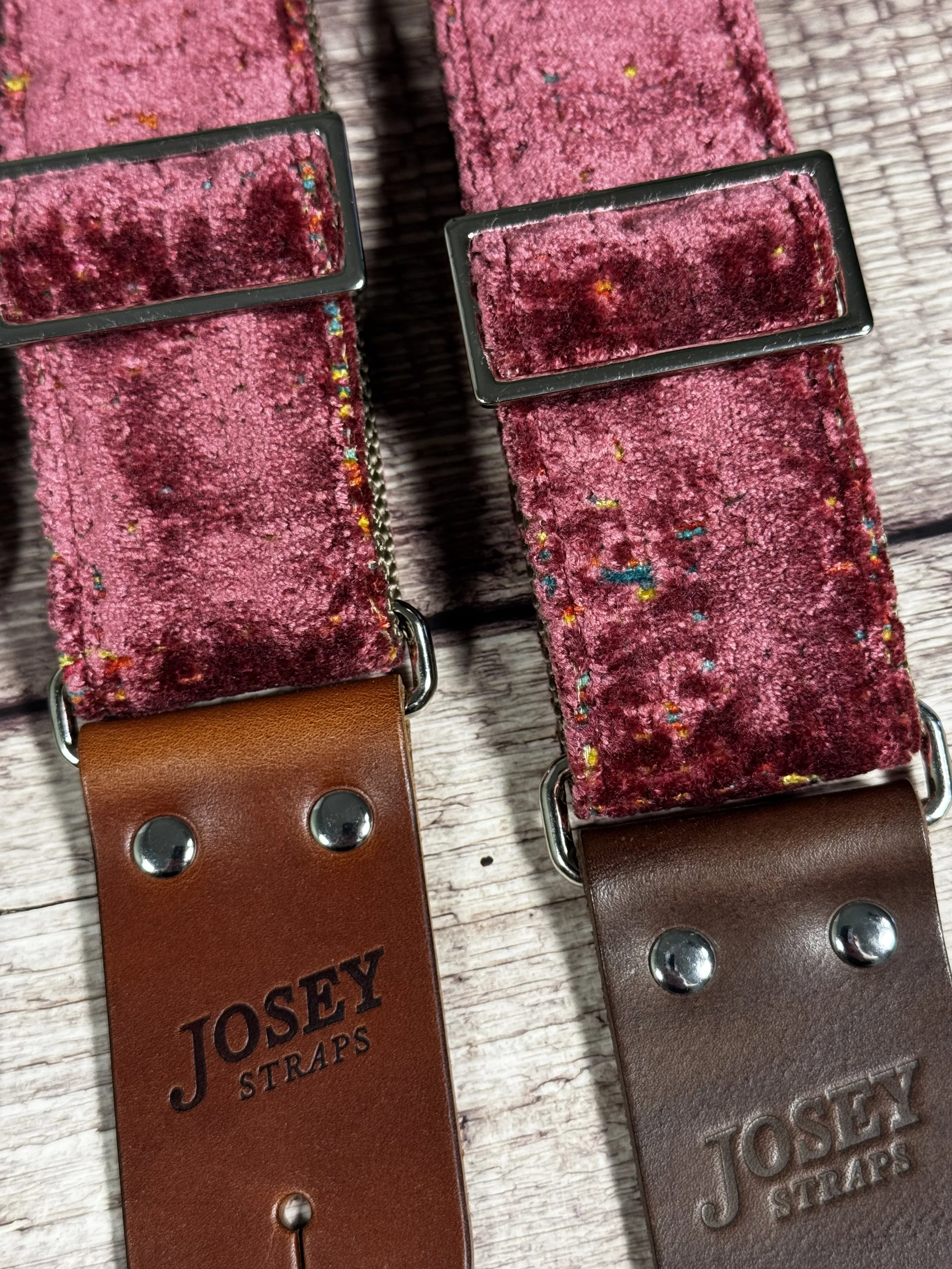 Telly handmade pink guitar strap by Josey Straps featuring textured dusty-rose fabric with colorful flecks and premium leather ends.