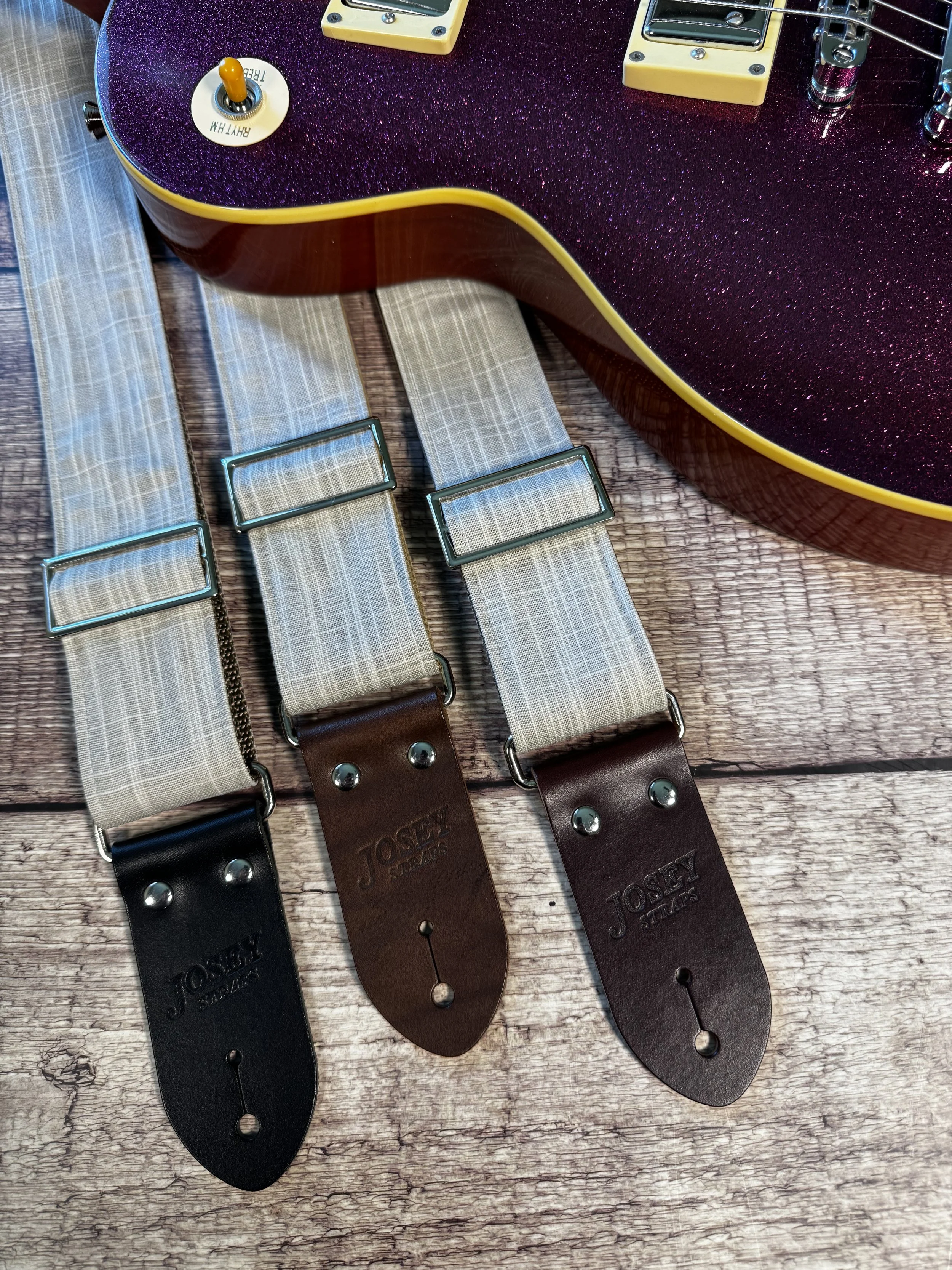 Greige handmade guitar strap by Josey Straps featuring a neutral gray-beige woven fabric and premium leather ends.