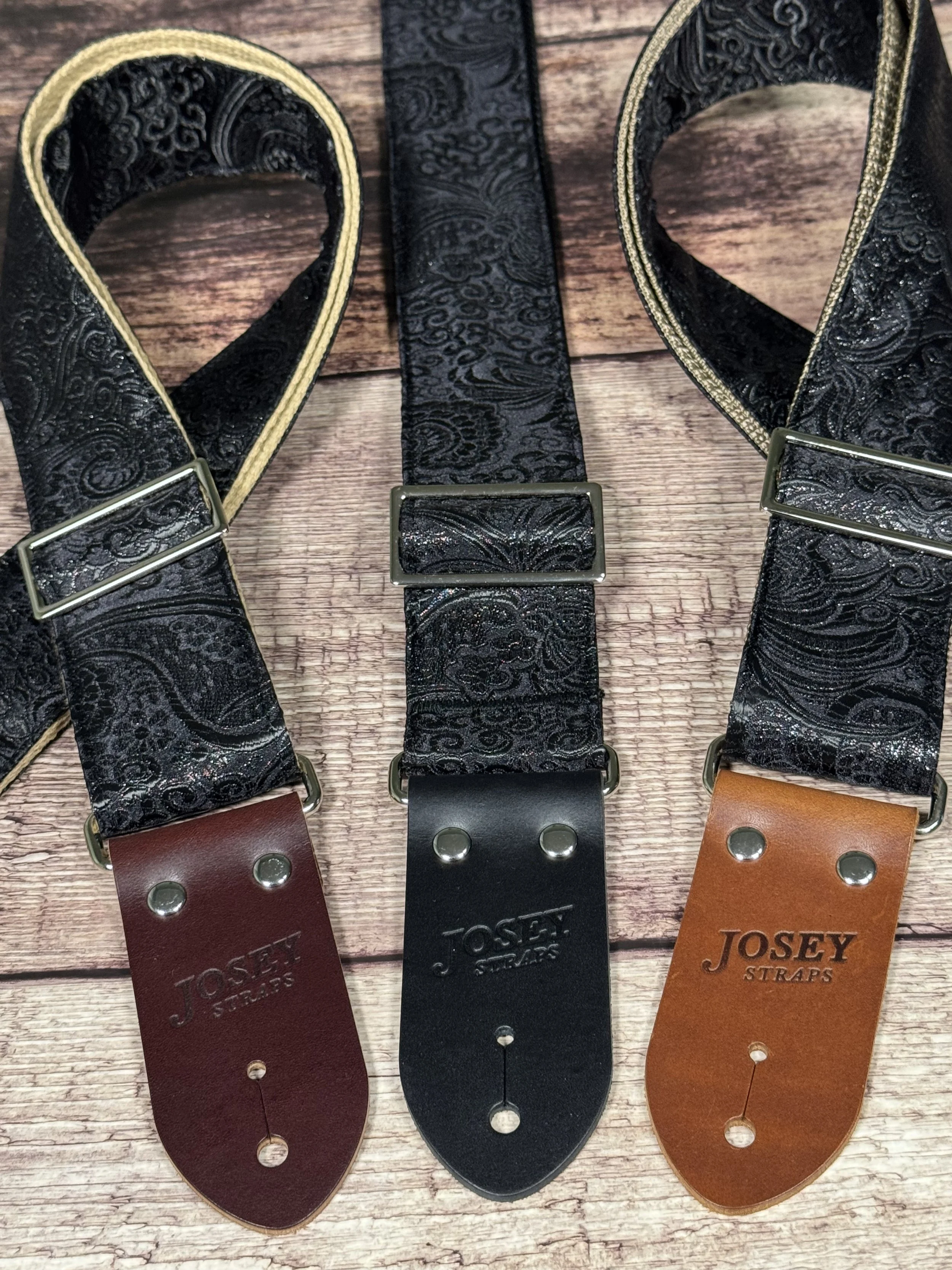Black textured guitar strap with leather ends by Josey Straps called The Abyss