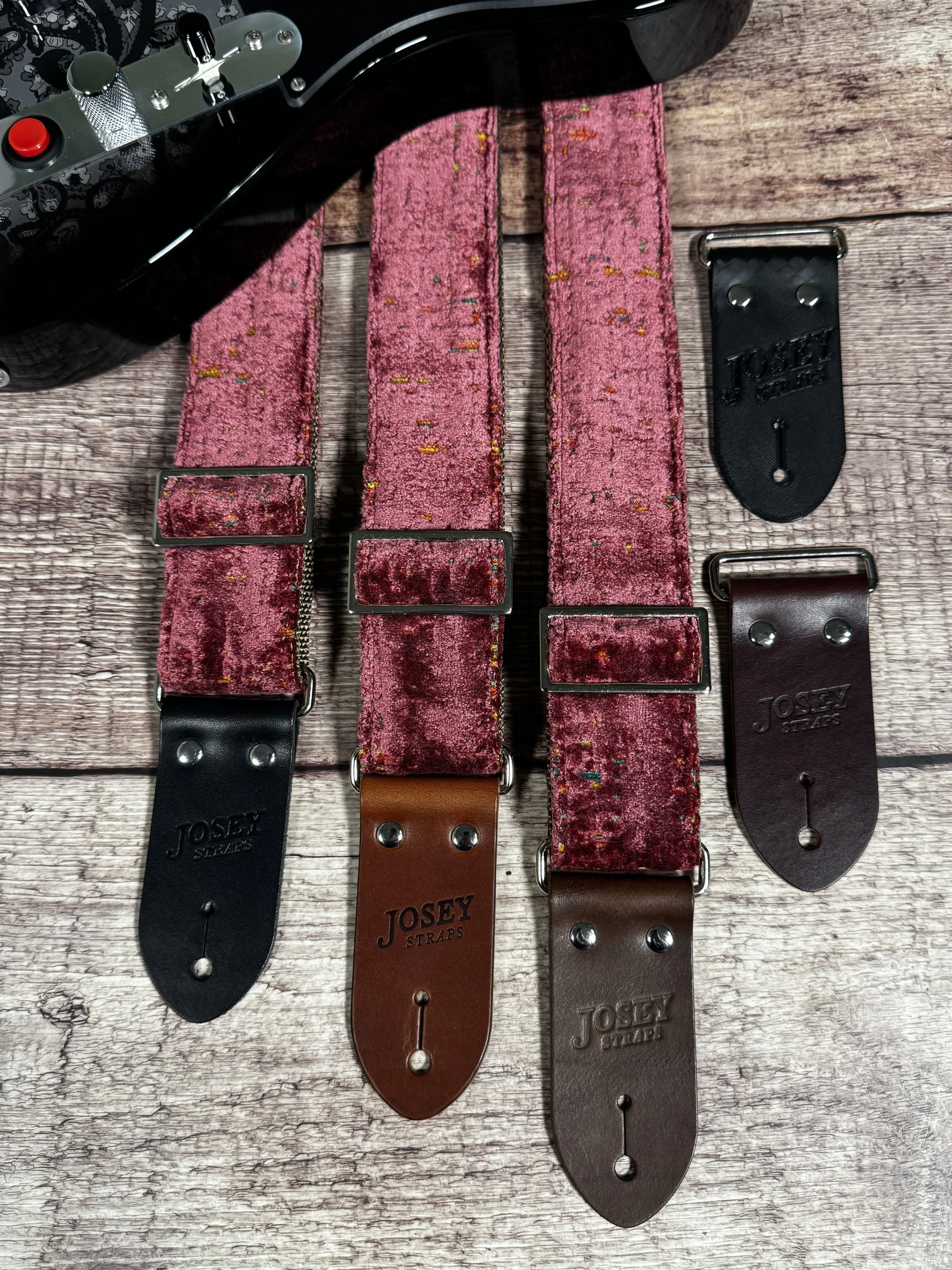 Telly handmade pink guitar strap by Josey Straps featuring textured dusty-rose fabric with colorful flecks and premium leather ends.