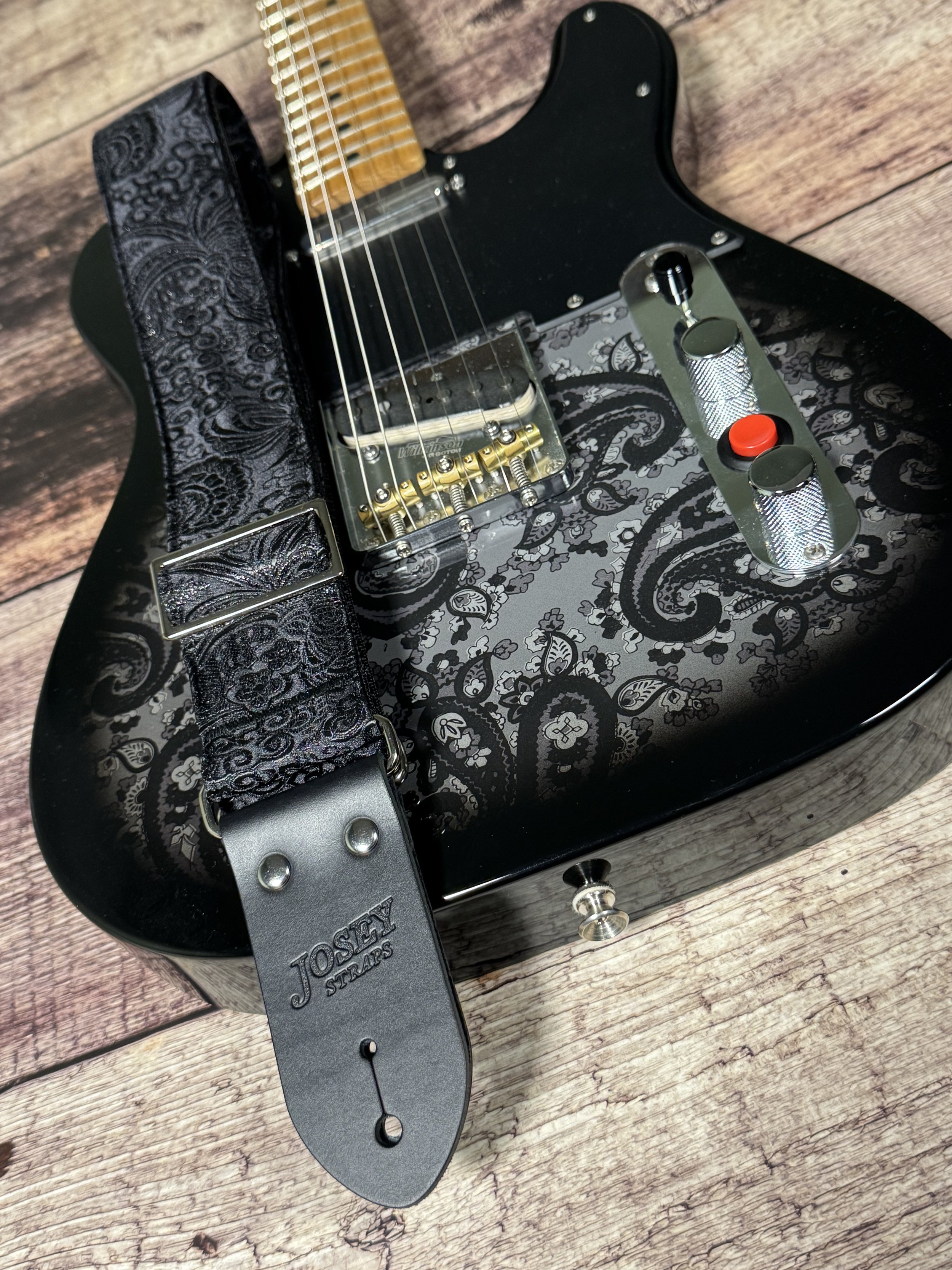Black textured guitar strap with leather ends by Josey Straps called The Abyss