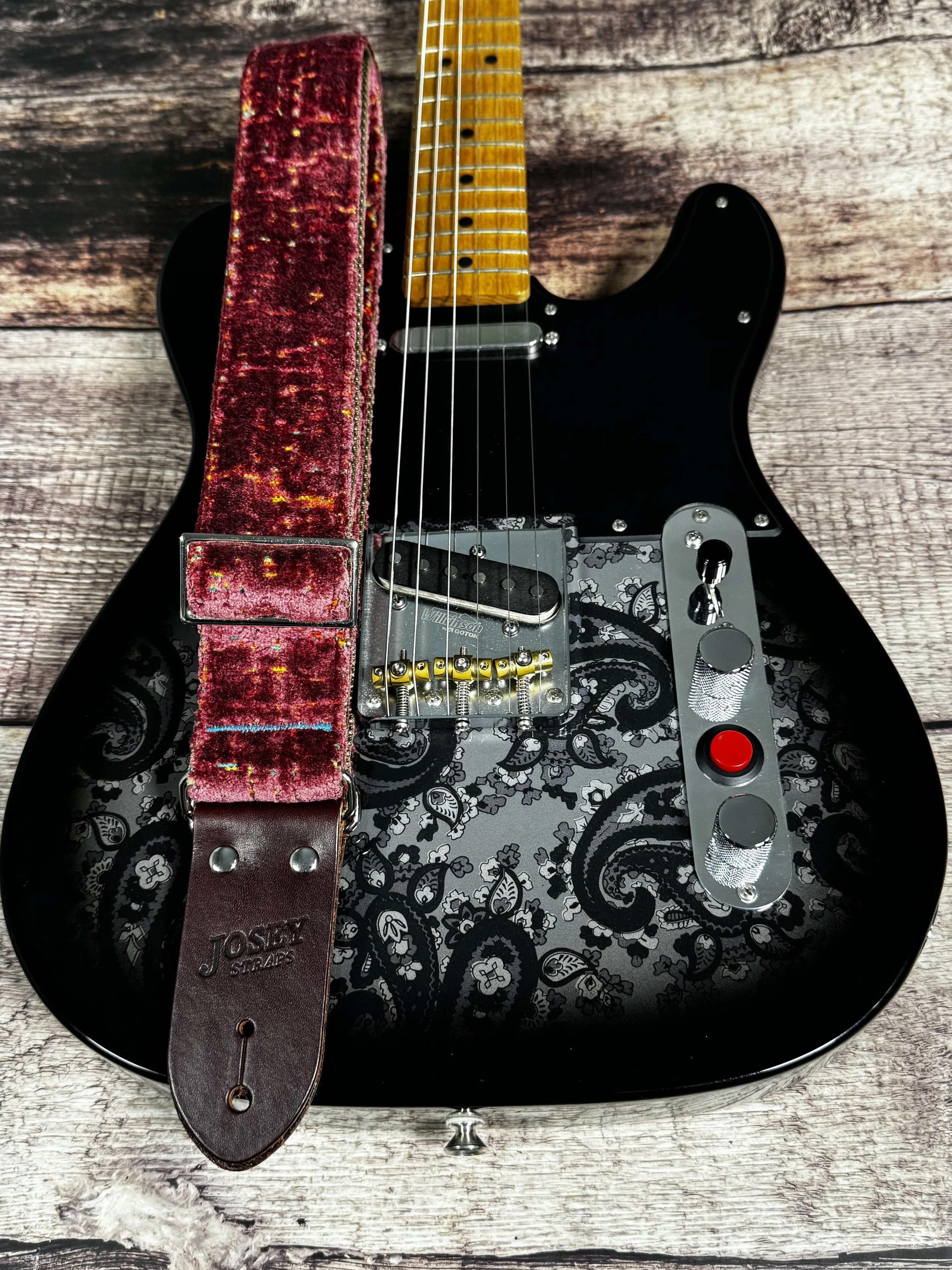 Telly handmade pink guitar strap by Josey Straps featuring textured dusty-rose fabric with colorful flecks and premium leather ends.