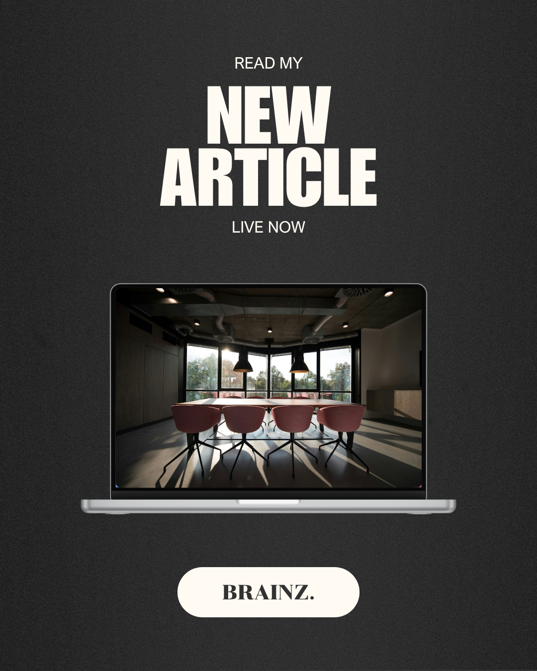 A promotional graphic with a dark background, featuring bold white text that reads 'Read my new article live now.' Below the text, there is an image of a laptop displaying a modern conference room with a table and pink chairs, sunlight coming through large windows. At the bottom, a white button with black text says 'Brainz.'