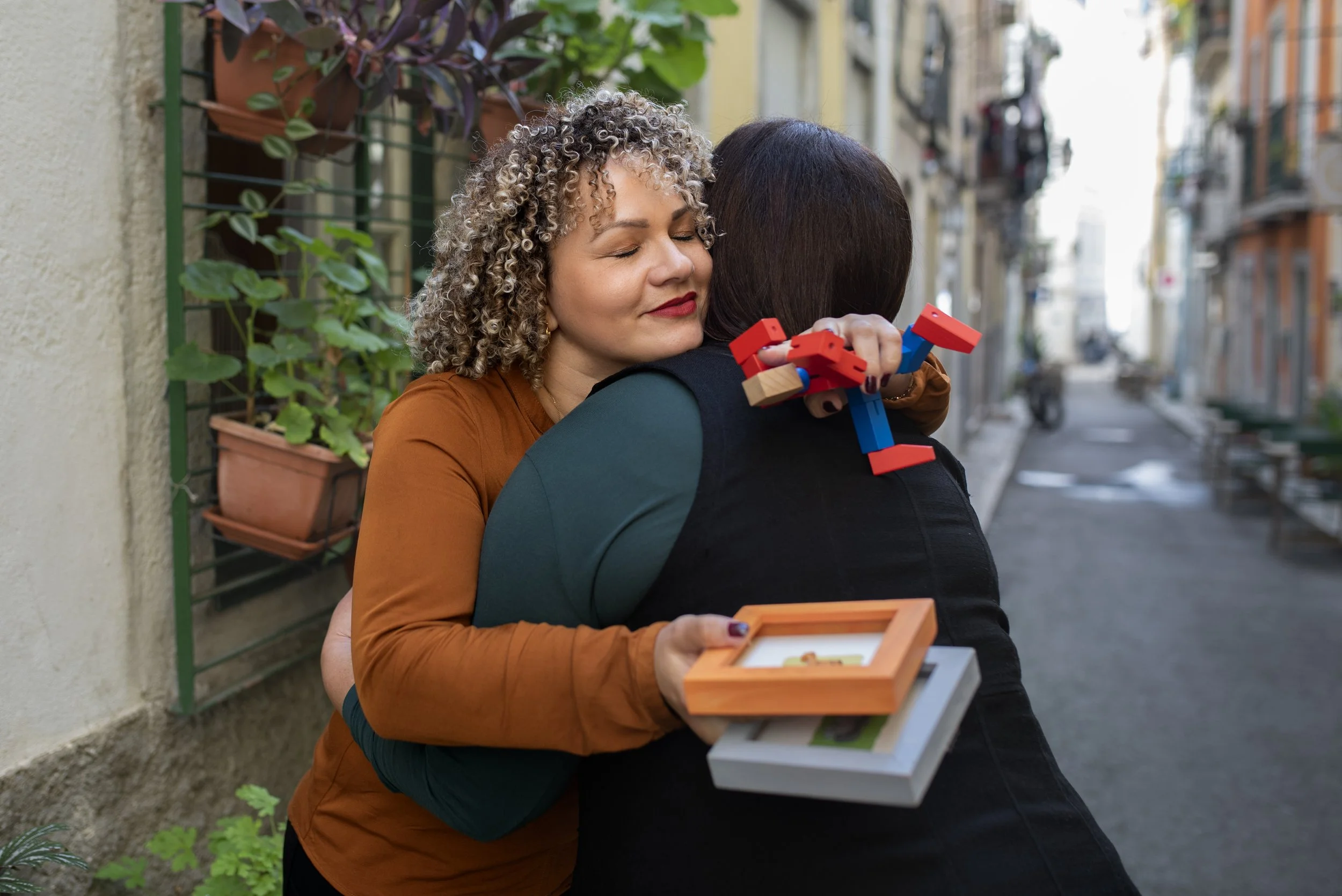 medium-shot-women-hugging.jpg