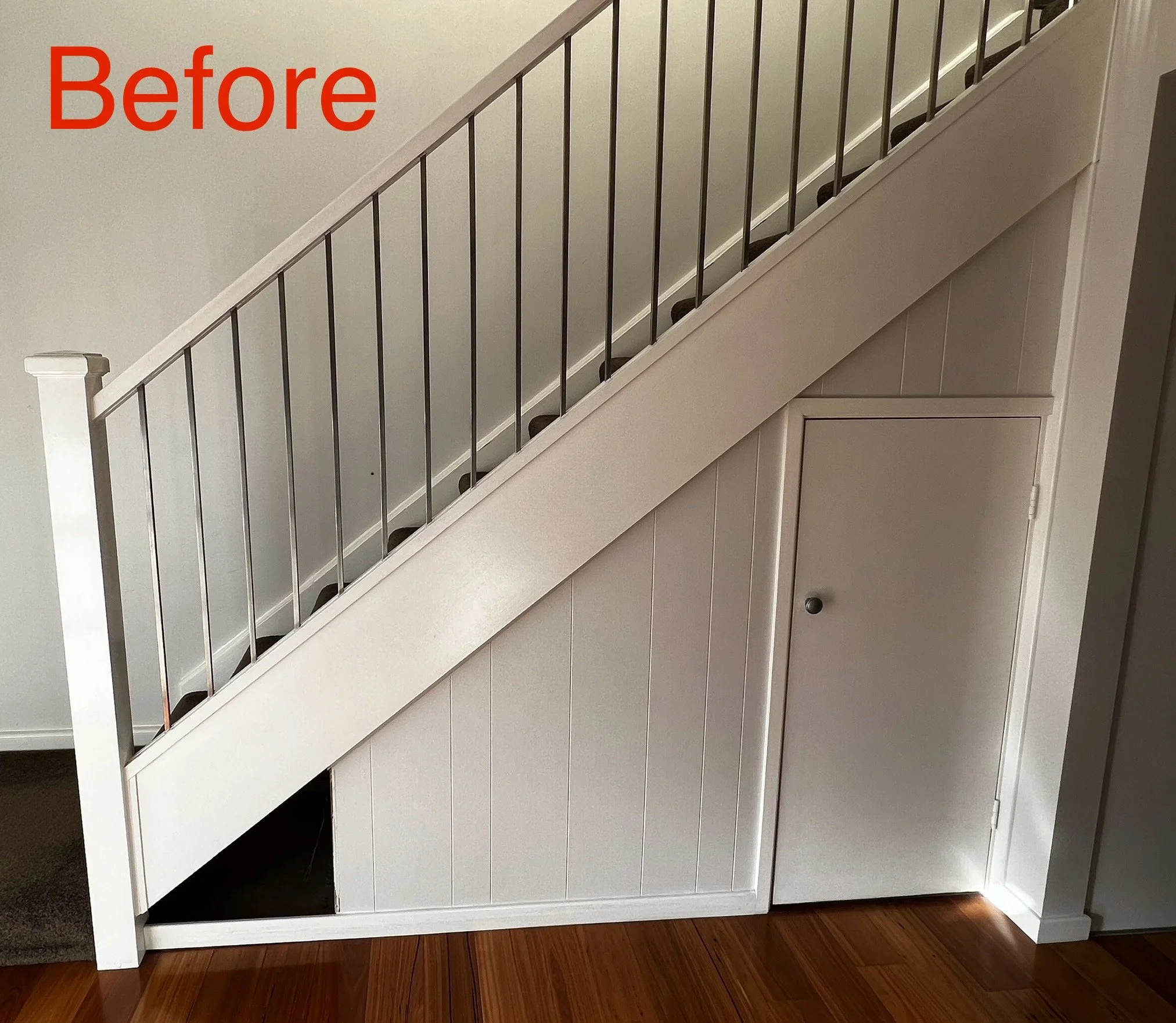 Before empty under stairs space awaiting cabinetry design