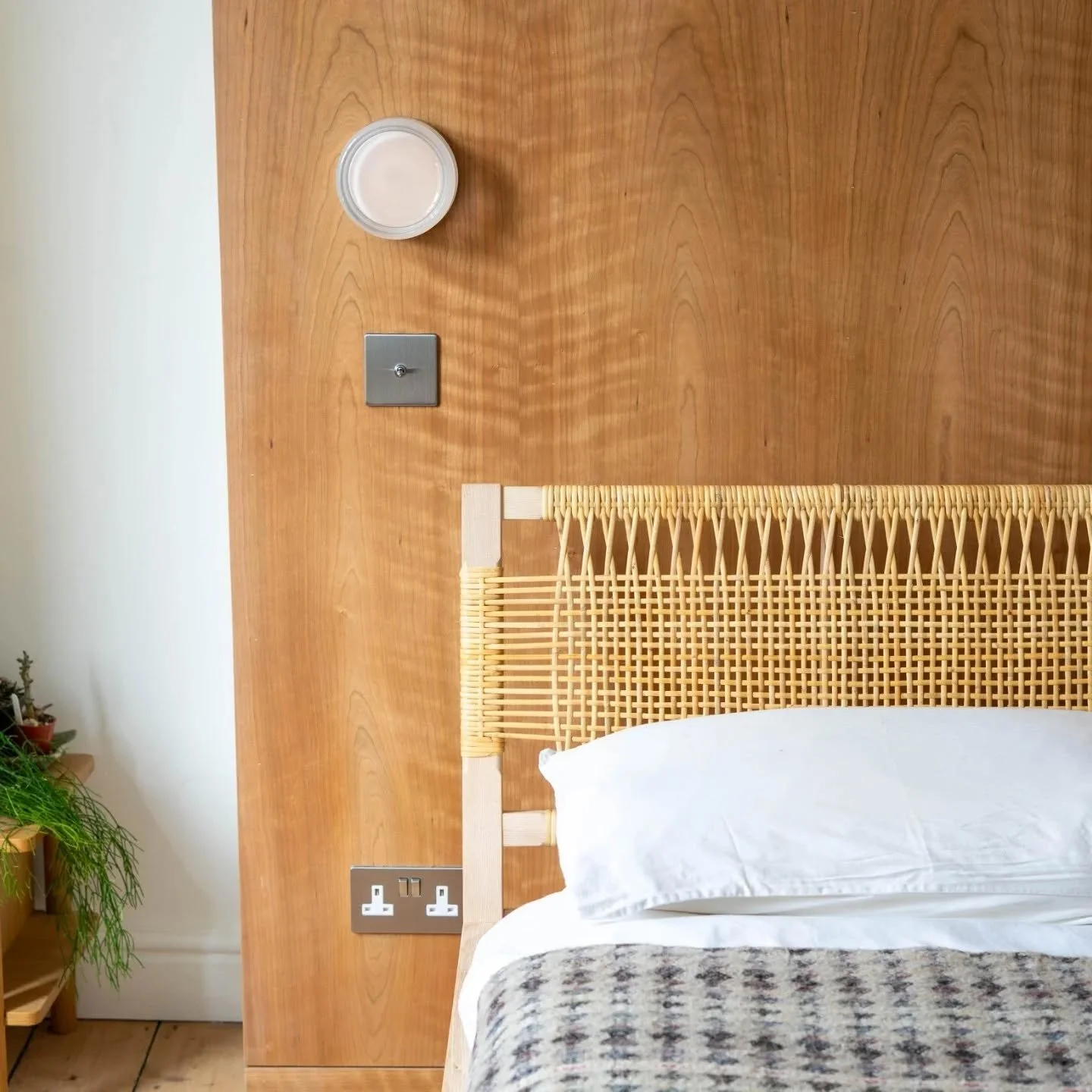 The Loom Bed

Crafted from locally grown solid ash, paired with a handwoven rattan headboard for warmth, lightness, and texture. The natural variation in both materials gives each bed its own quiet character.

The exposed joinery is a considered deta