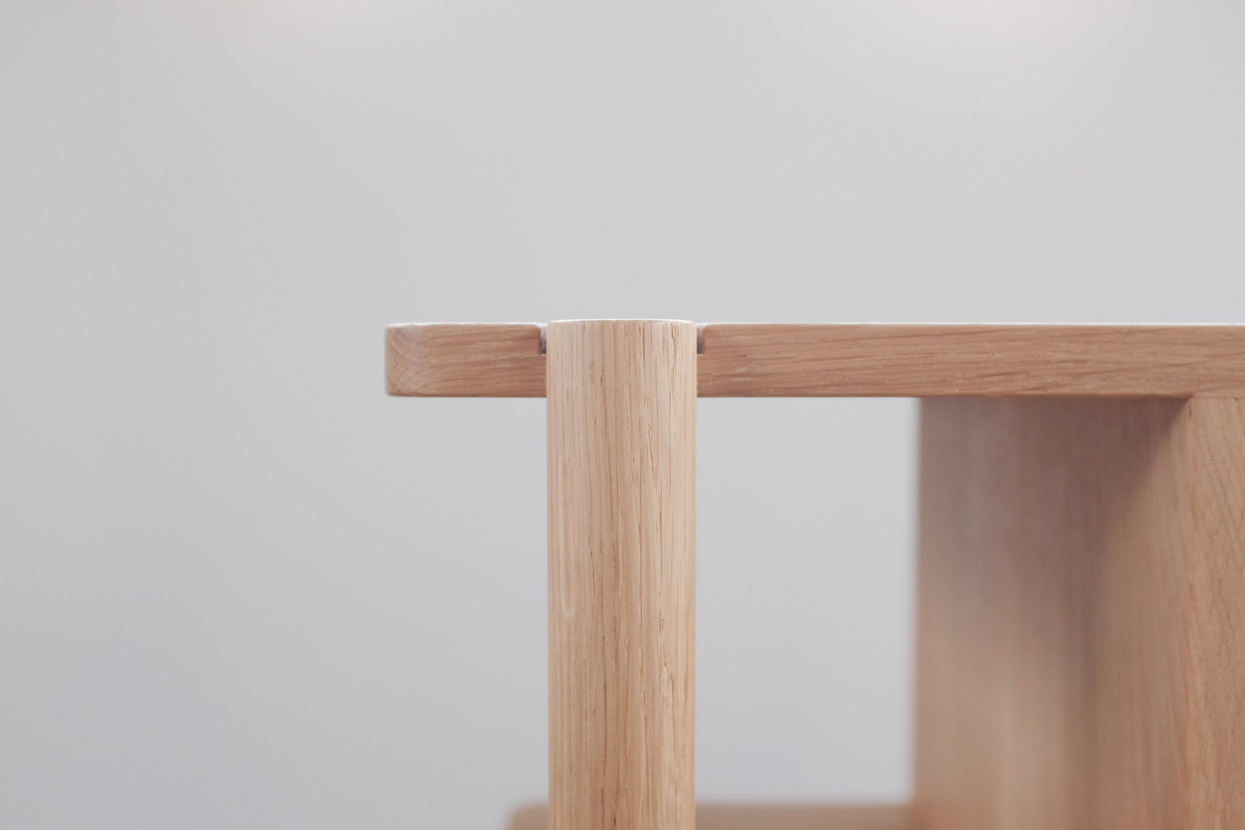 Circular oak leg and panel top.