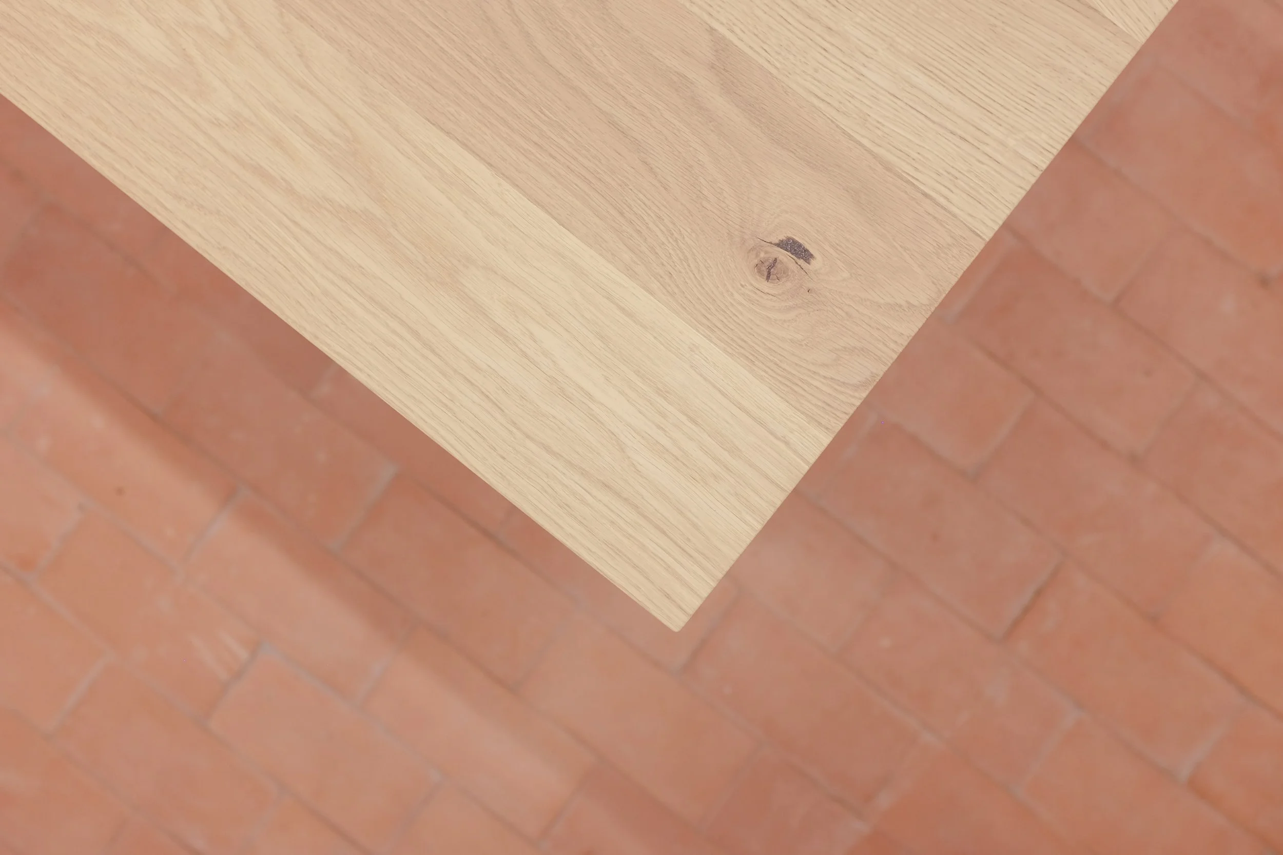 Knot detail on the Origin table - knot filled with coffee for a subtle textured natural effect.
