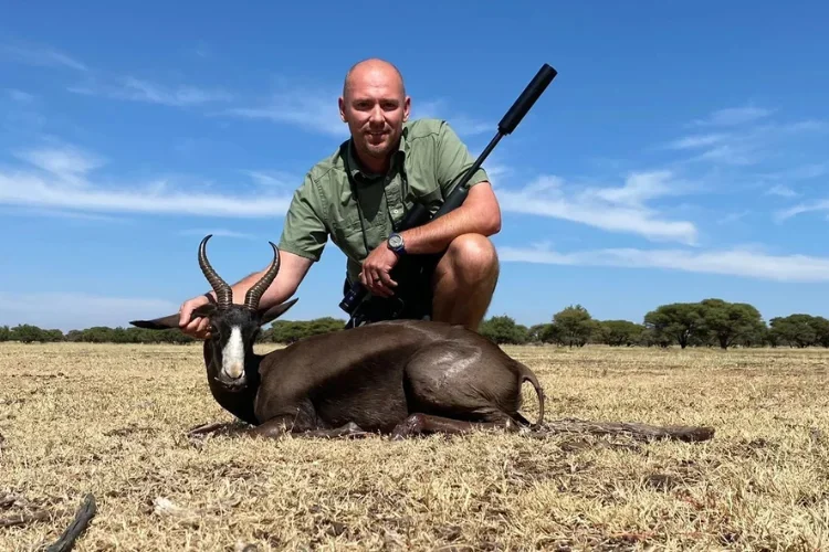 Hunting at Berendina Wildsplaas South Africa - male guest posing with black springbok