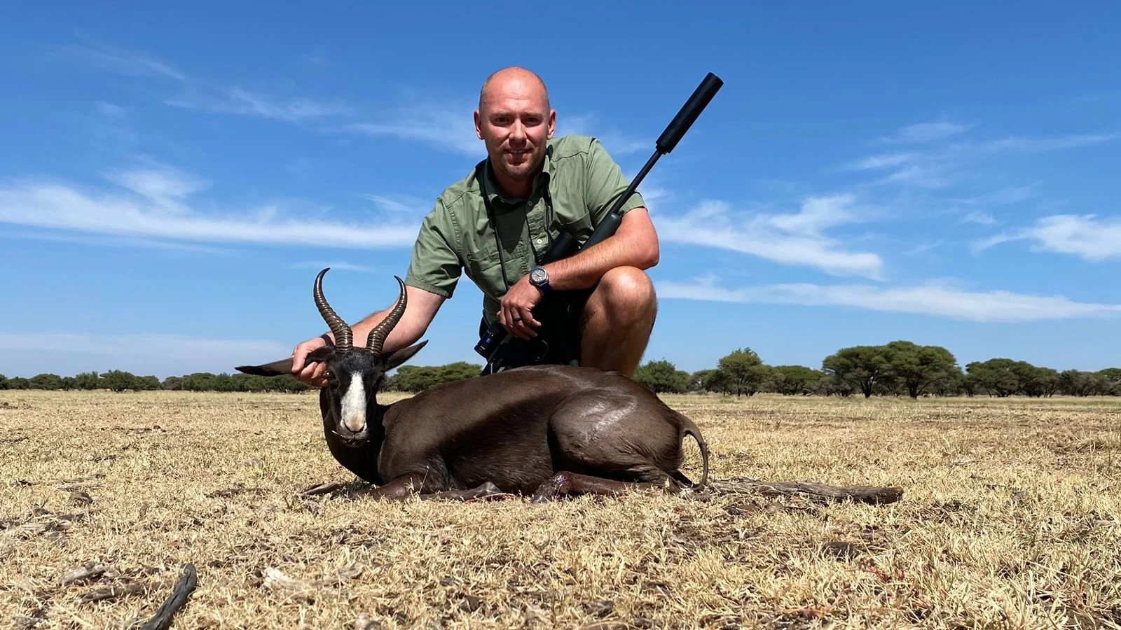 Hunting at Berendina Wildsplaas South Africa - male guest posing with black springbok