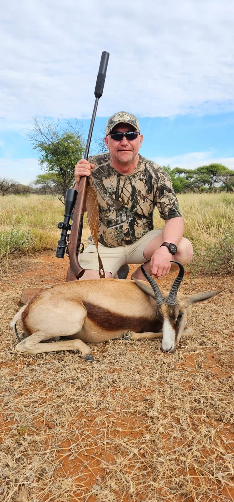 Hunting at Berendina Wildsplaas South Africa - male guest posing with copper springbok 