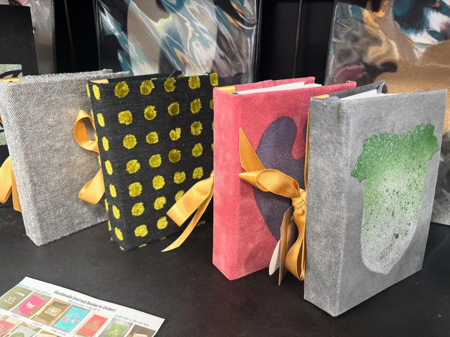 Handcrafted journals made with re-claimed/up-cycled fabrics. Each book has a title, edition, signature and art image with an inspirational quote. Loving made by @nataliastevensonoake