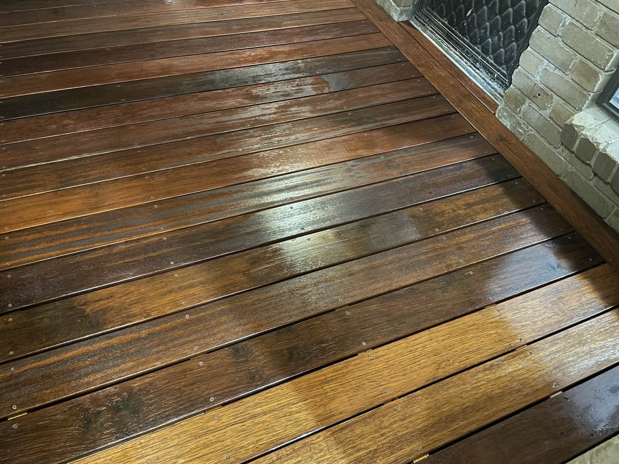 Finished covered timber deck with even oil coverage across the boards