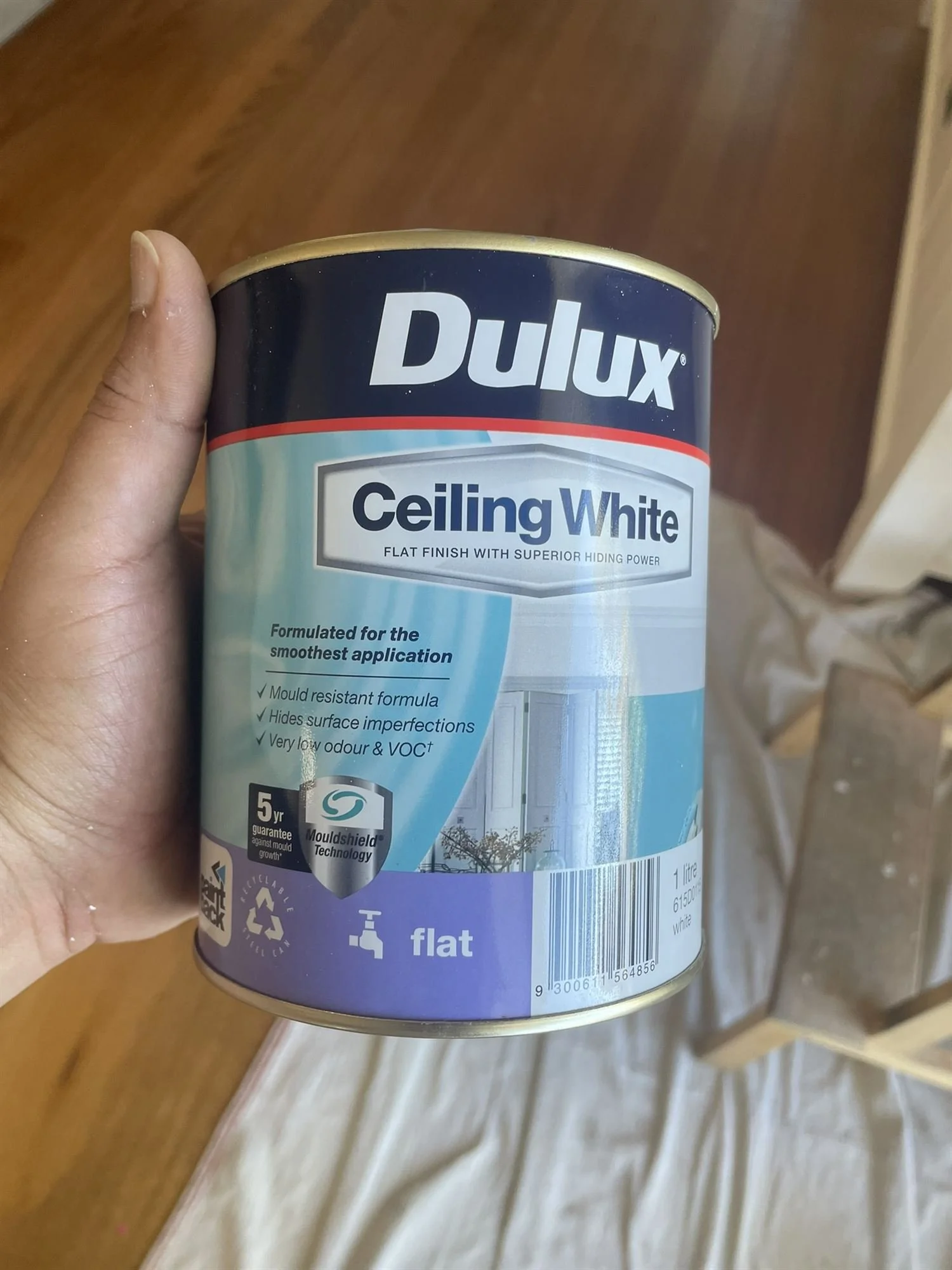Tin of Dulux Ceiling White flat paint used for the ceilings