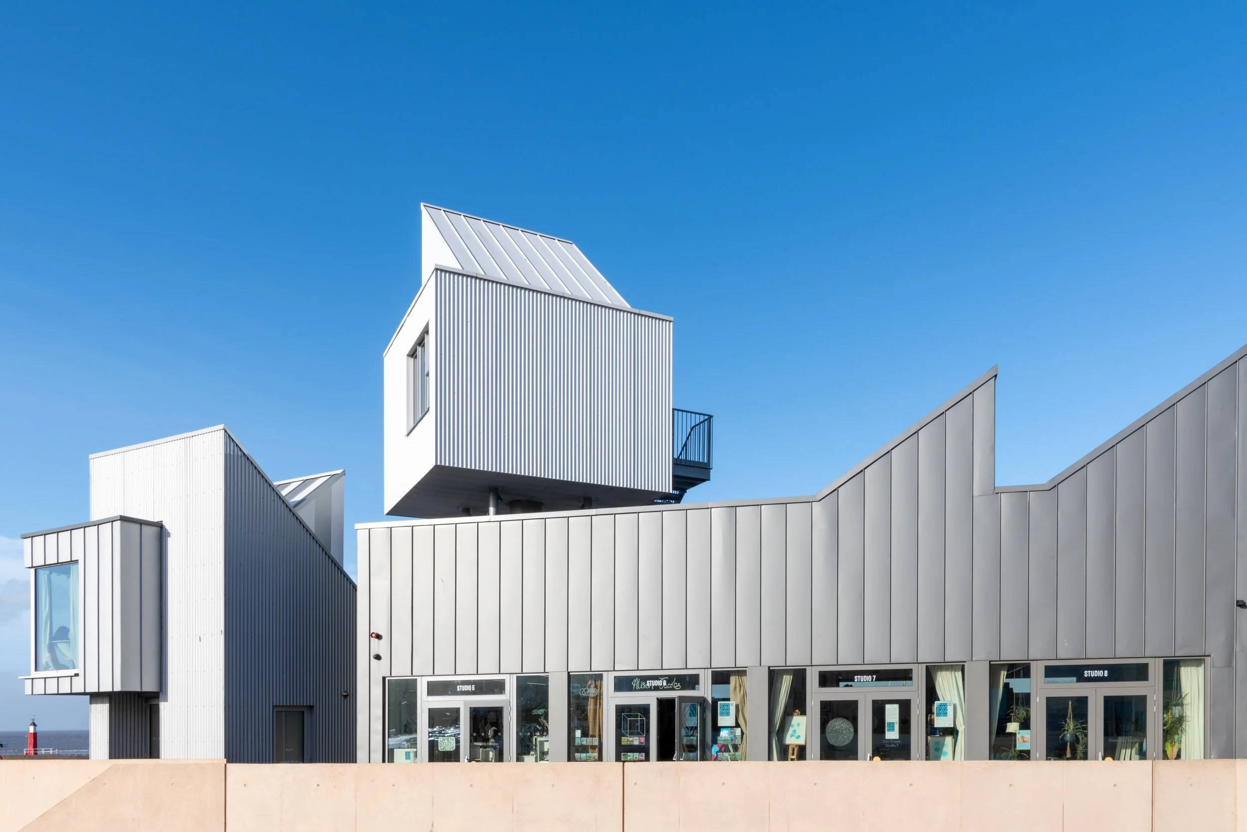 East Quay Watchet exterior view zinc cladding with angular pitched roofs