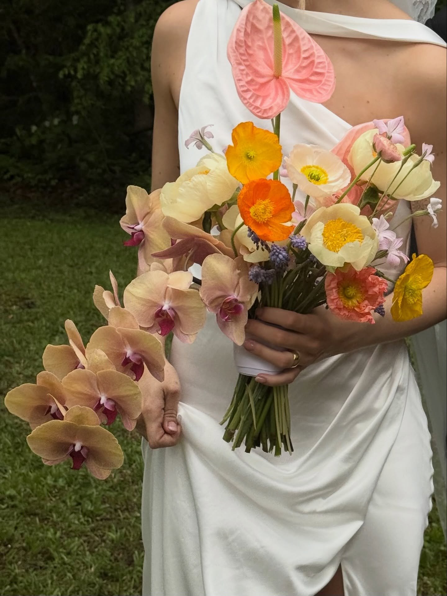 Mary Grace and her bouquet 🫧 Full of color and whimsy. 

I can&rsquo;t get over how beautiful of a bride MG was and how much it meant to be a part of her and Christian&rsquo;s wedding day. How these two can make an entire wedding party and crew feel