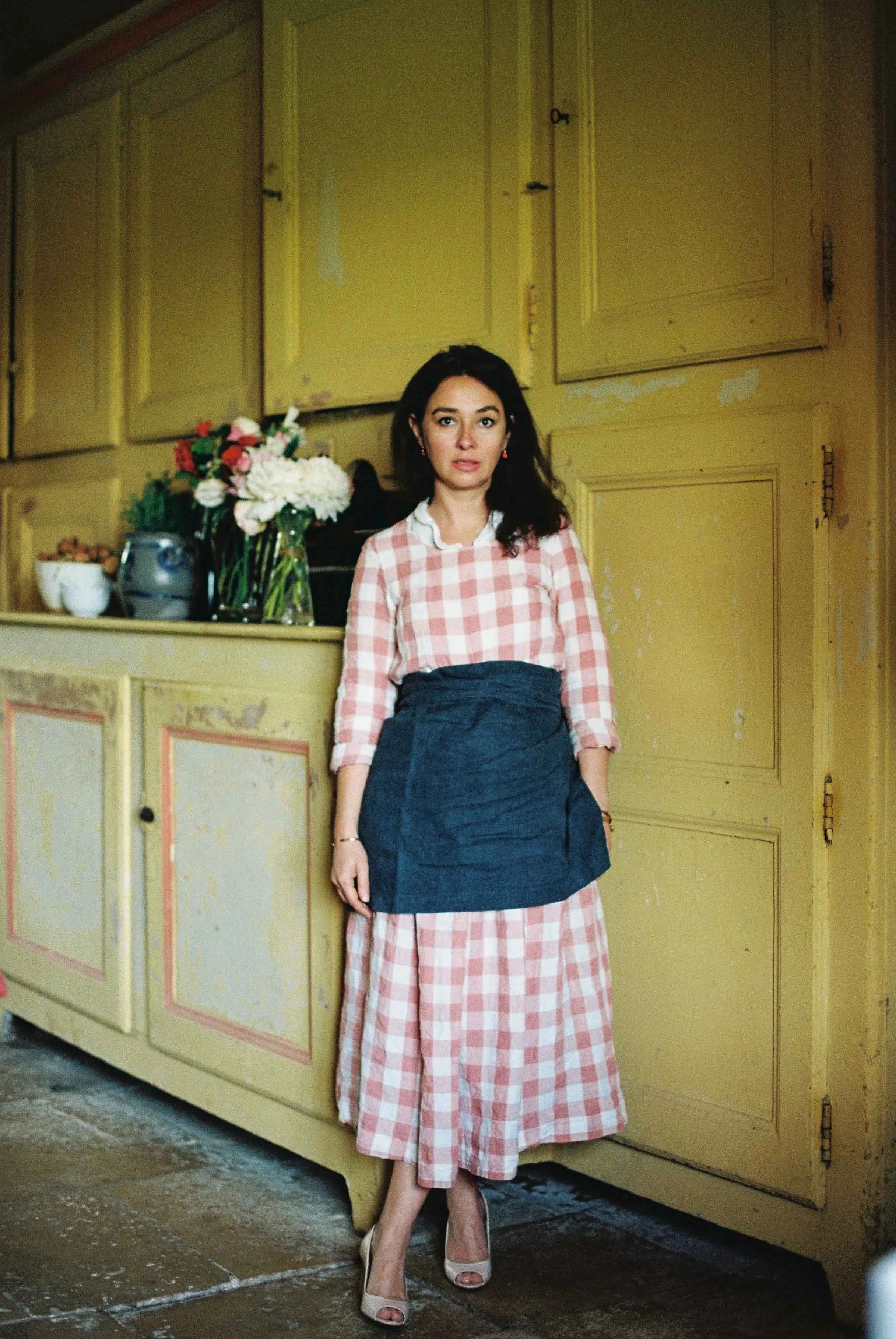 editorial-portrait-woman-in-yellow-kitchen-london-film-photographer.jpg
