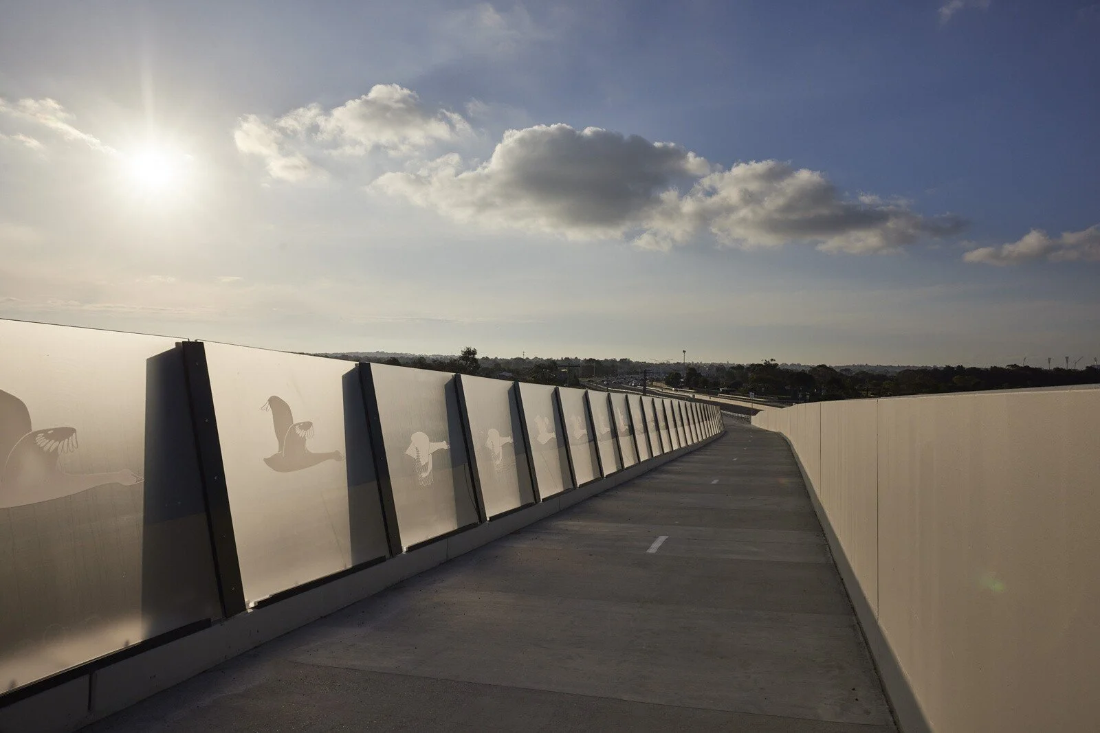 Geelong architecture, Surfcoast architecture, Melbourne architecture, urban design design, regional architecture, Barwon Heads Road duplication, level crossing removal, Big Build, road over rail design, bridge, shared user path, black swan, tradition