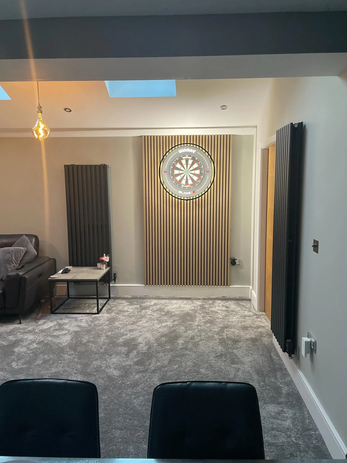 Letsss play darts 🎯 ! 
We squeezed in this small but effective job for our valued returning customers Laura &amp; Gav. Premium acoustic panelling from AkuWoodPanel fitted with a lighting feed discreetly concealed behind. The perfect addition to this