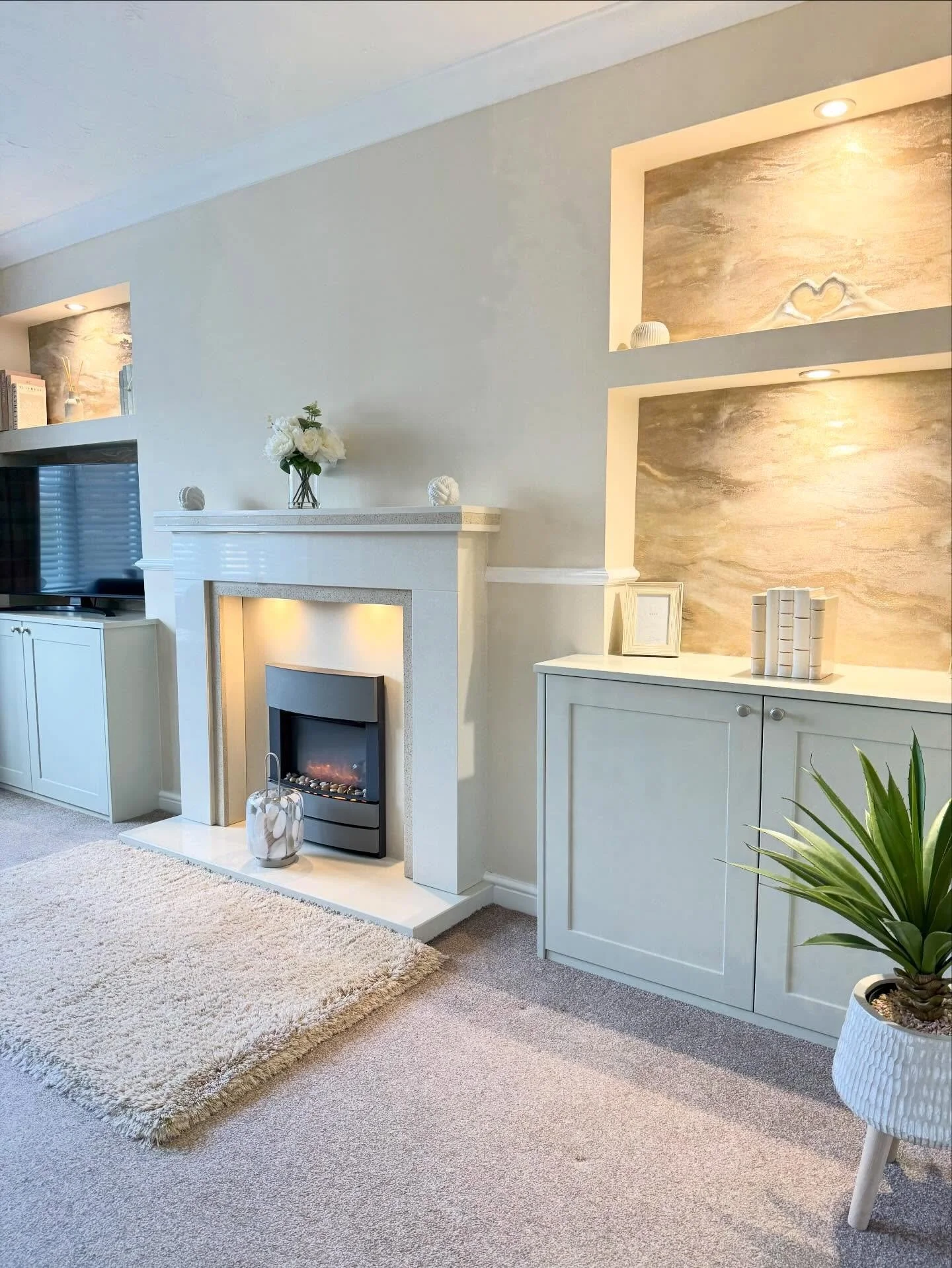 A recent living room transformation designed to create a true focal point 🤩. 

Chunky plastered shelves &amp; upper bulkheads with integrated downlighting were built, seamlessly tied into the existing chimney breast, giving the impression they&rsquo