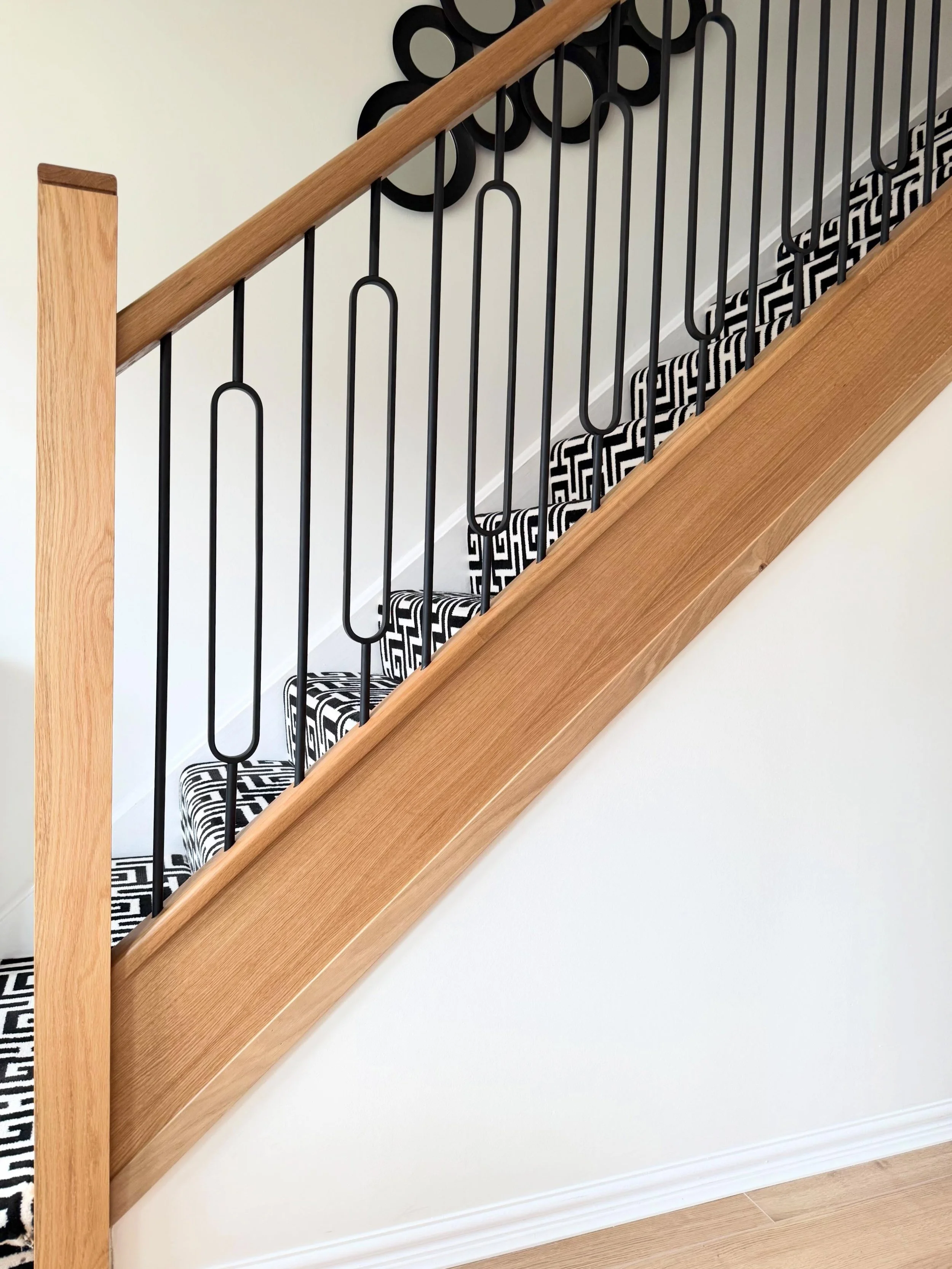 ✨ Recent staircase transformation completed ✨

This project featured beautiful @richard_burbidge solid oak stair components, finished with alternating loop &amp; plain cast iron effect spindles for a classic but modern look 🪵⚫

We also clad the oute