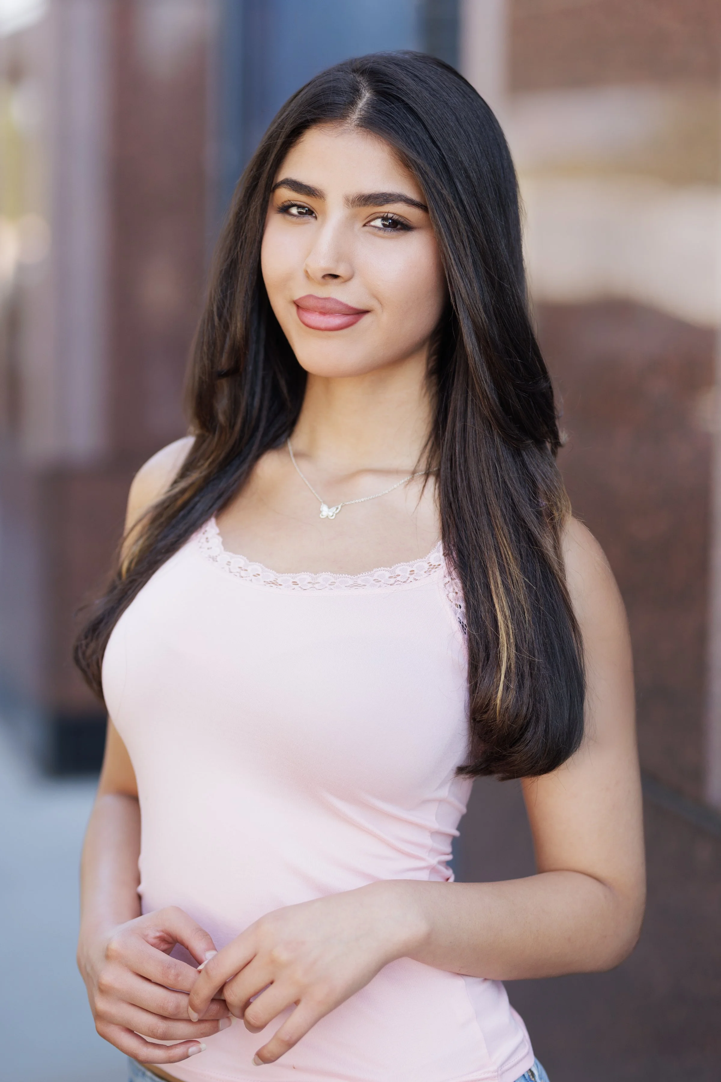 An elevated editorial headshot featuring the actor with slicked-back hair, styled for a bold, high-fashion aesthetic. Captured with sculpted lighting and sharp contrast, the expression is confident and commanding — ideal for fashion campaigns, luxury