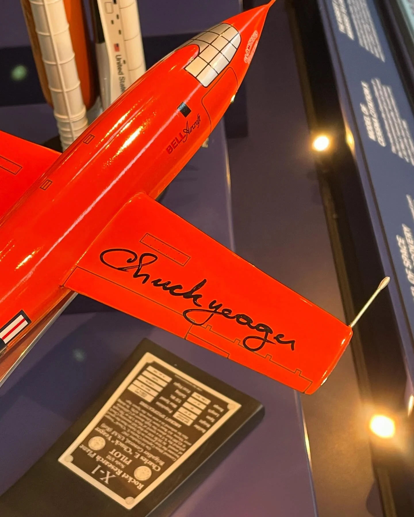 A model of the X-1 plane signed by pilot Chuck Yeager. 
The X-1 plane was the first to break the sound barrier in 1947.  For context, this was only 44 years after the Wright Brothers made their first flight at Kitty Hawk in 1903. Pretty impressive!