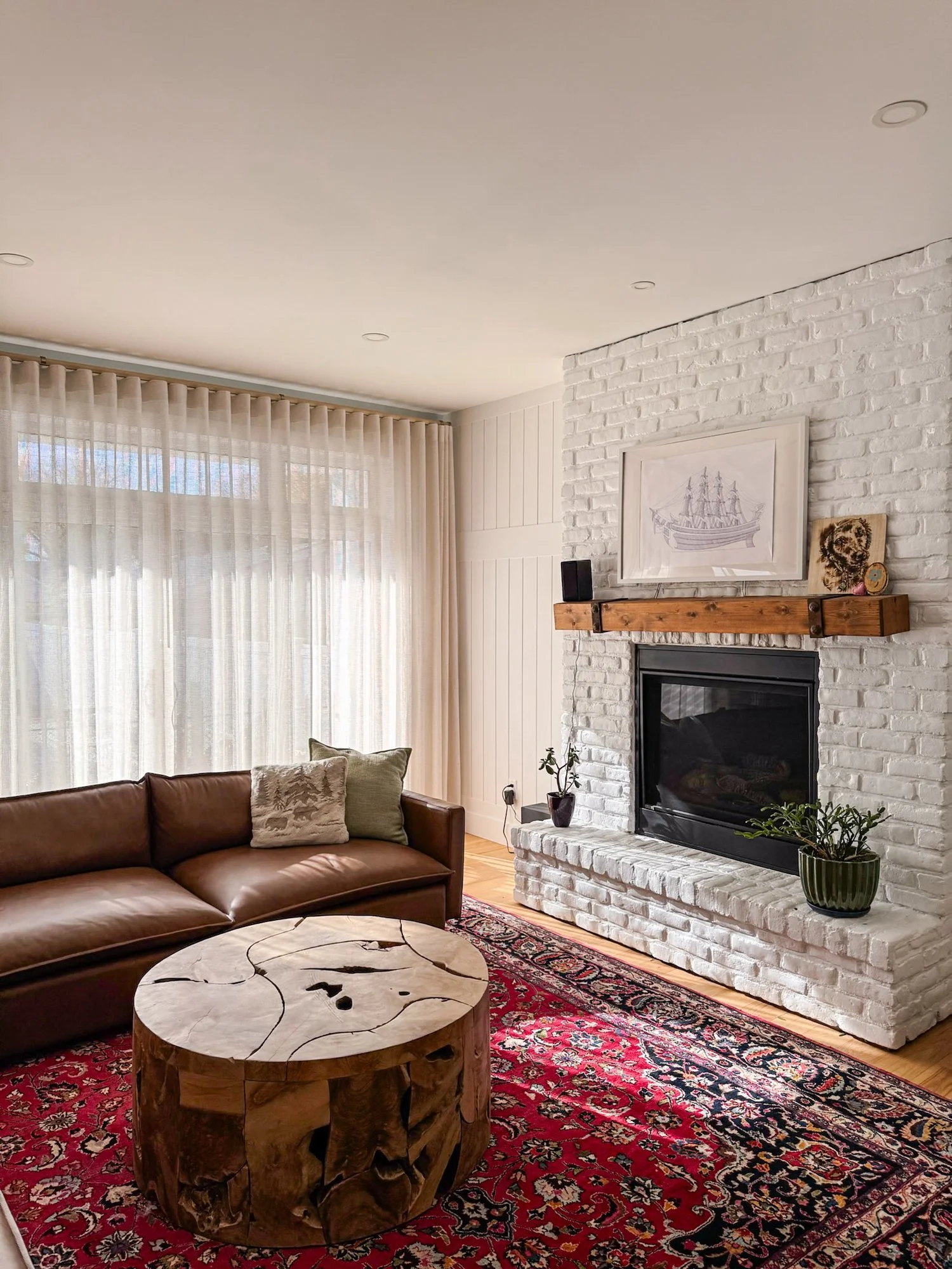 coastal-house-living-room-ripplefold-sheer-drapery.jpg