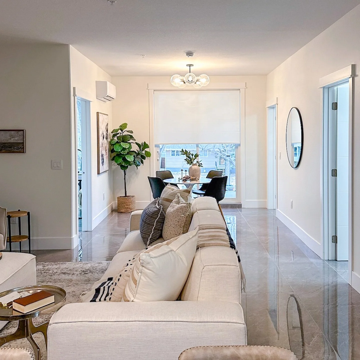 We love working with our local community, and this Blackrock condo was all about finding the perfect balance between function and refined design.

For this space, we selected Graber Cordless Lift Solar Roller Shades, thoughtfully installed with a rev