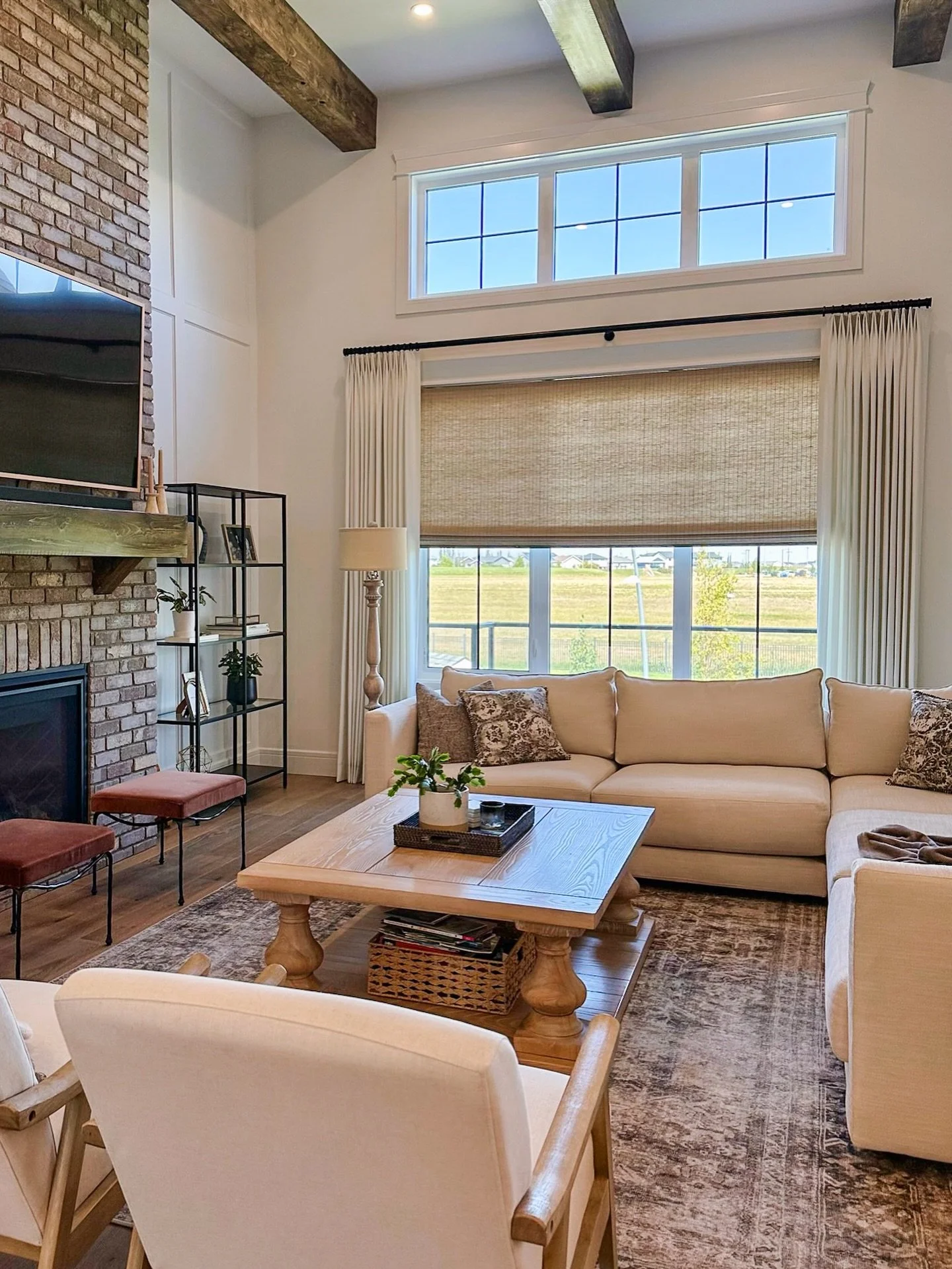 Swipe to get up close with these Motorized Natural Shades &amp; Custom Drapery (unlined) Side Panels 😍

This room deserved something spectacular and this combo was IT❣️

💫 Follow us for more spectacular room inspiration 
❣️ Serving Saskatoon &amp; 
