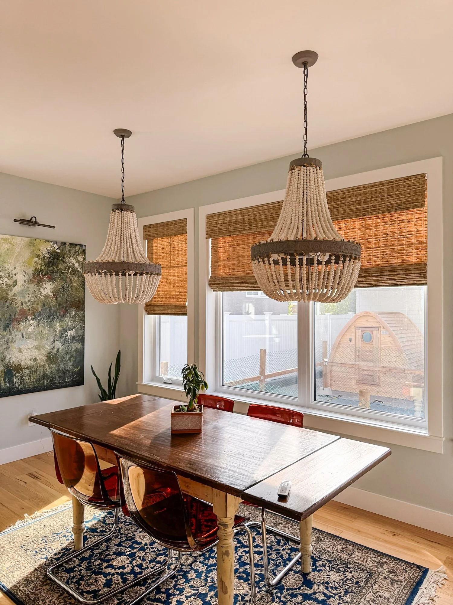 coastal-house-dining-room-motorized-woven-wood-shades.jpg