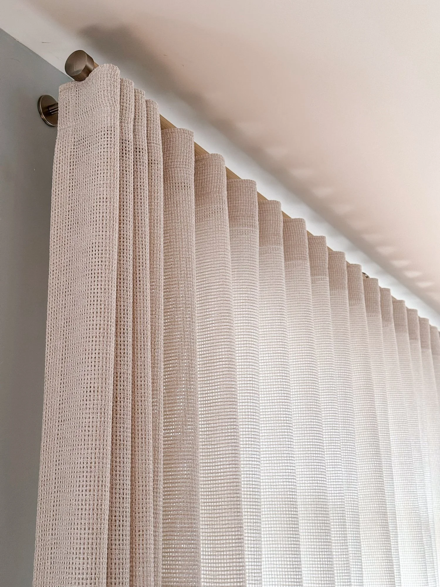 coastal-house-ripplefold-drapery-wood-rod.jpg