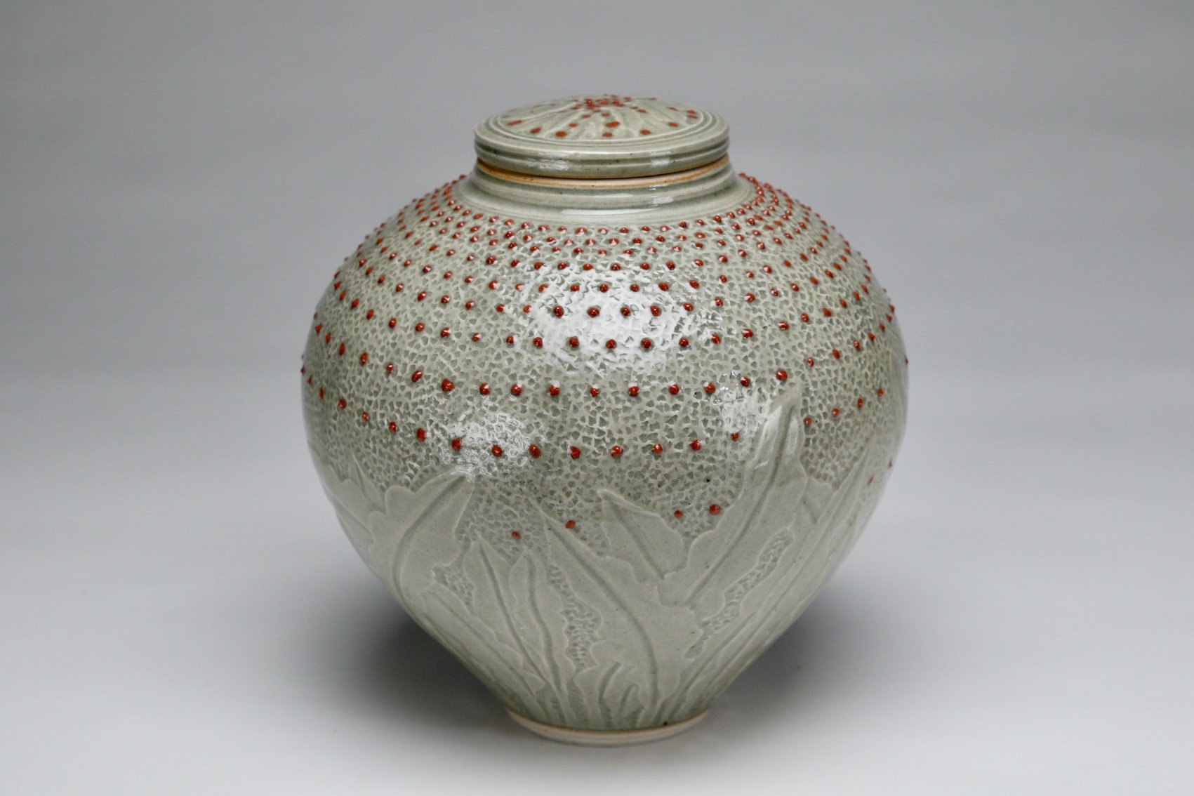 Malcolm-Cooke-carved-jar-celadon.jpeg
