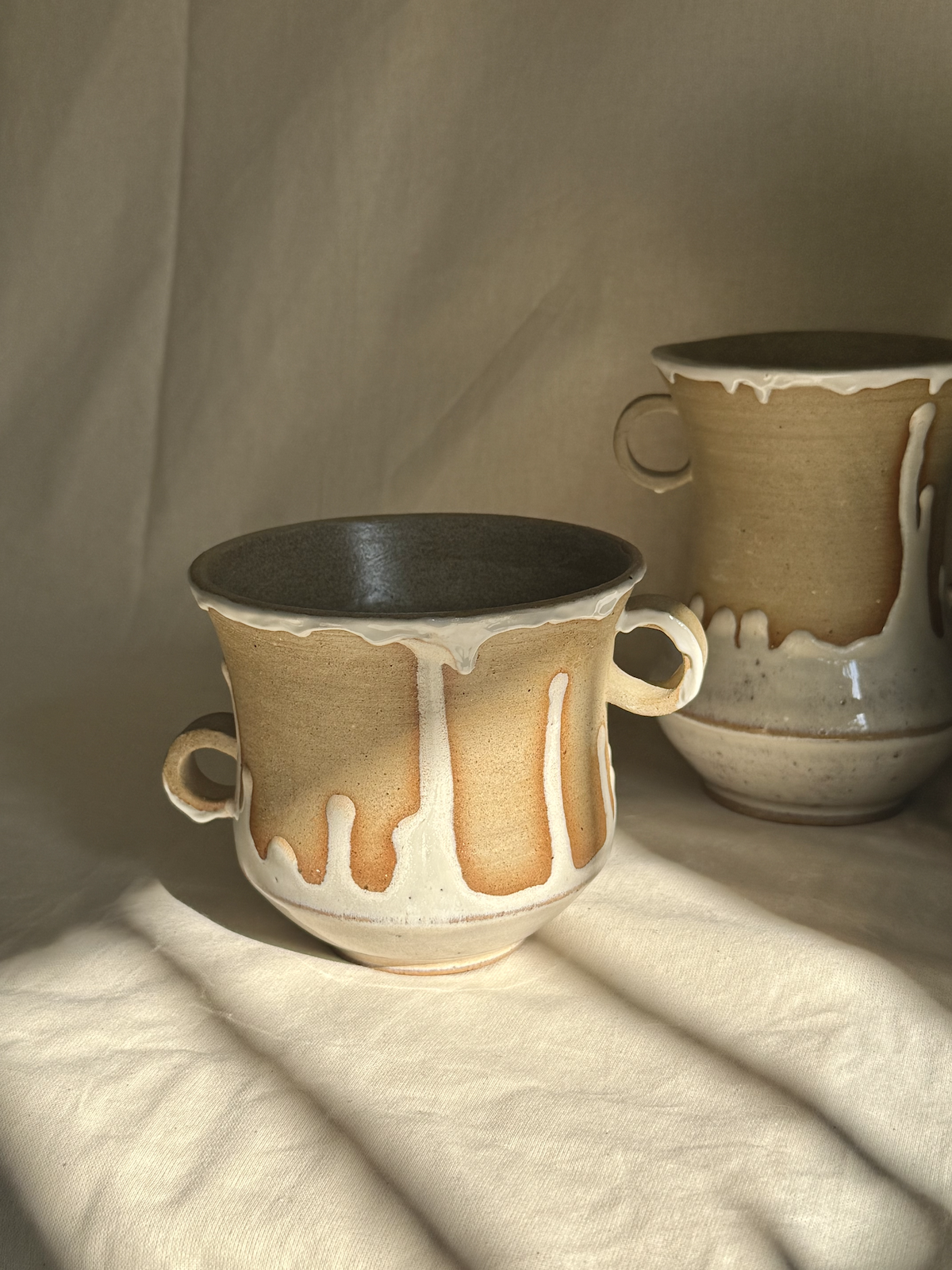 against-gravity-vases-cream-wide.png