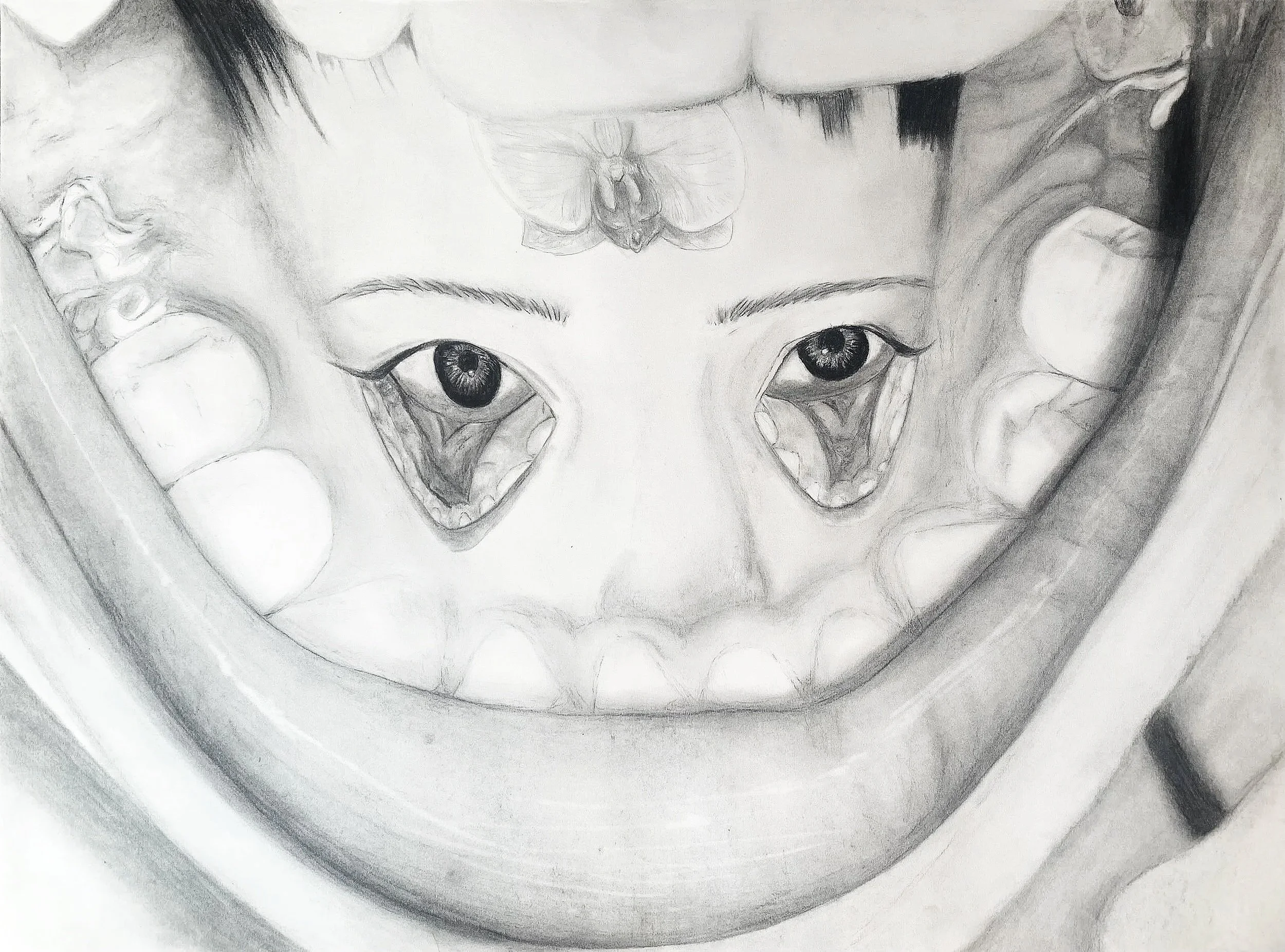 A pencil drawing of a baby's face with realistic eyes, surrounded by what appears to be teeth, possibly depicting a smile or a mouth, with detailed shading and textures.