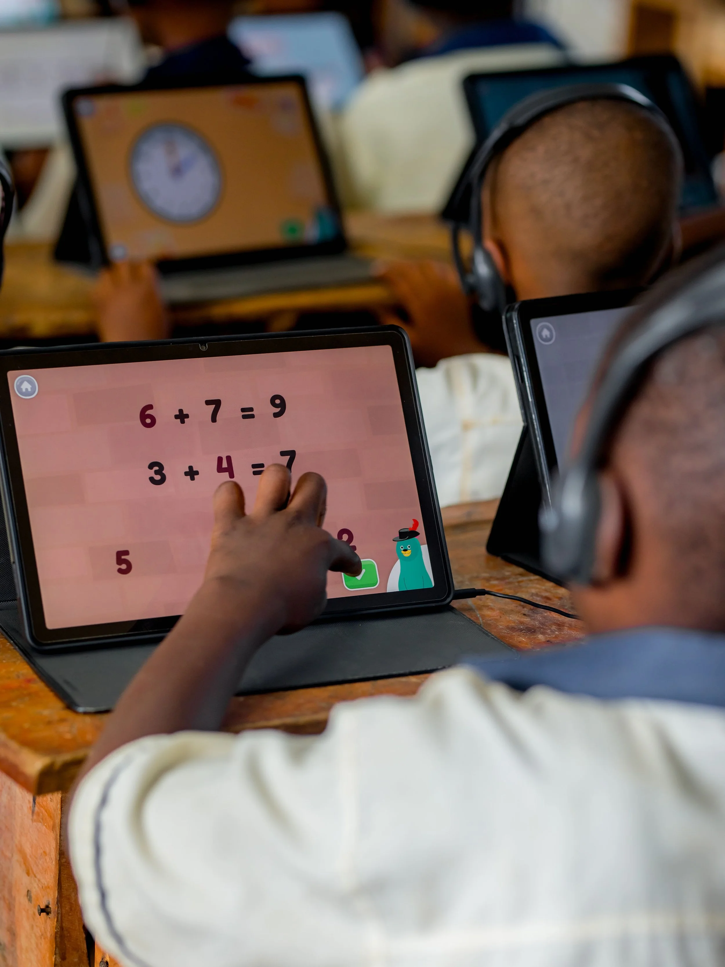 A Child with An AI Tablet Learning Program