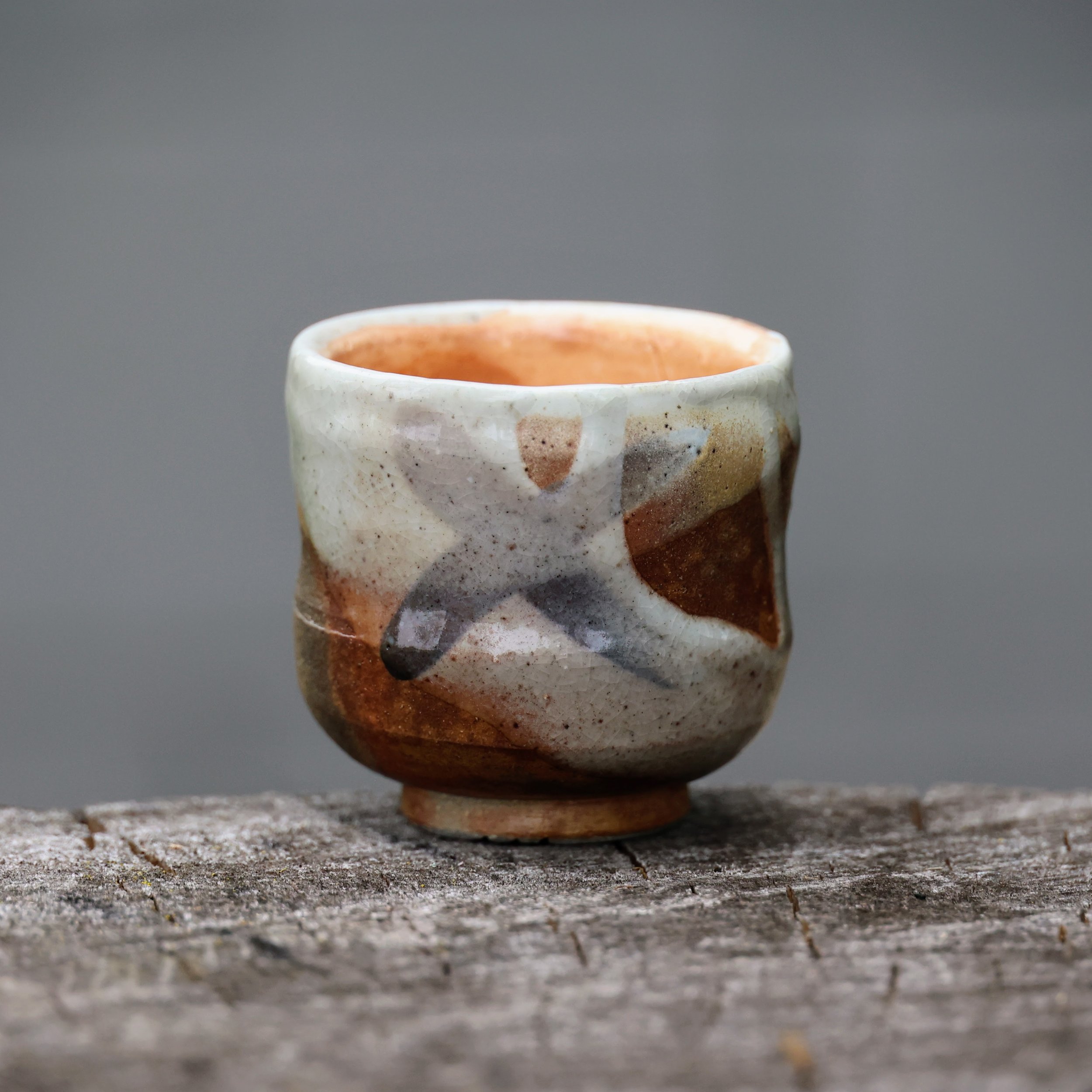 Guinomi (sake cups). 

It pays to be a volume shooter with these. That's a basketball term for the ball knowers. Stick these in every nook and cranny of the kiln between the larger pots and some of them will inevitably turn out great. Even the quiete